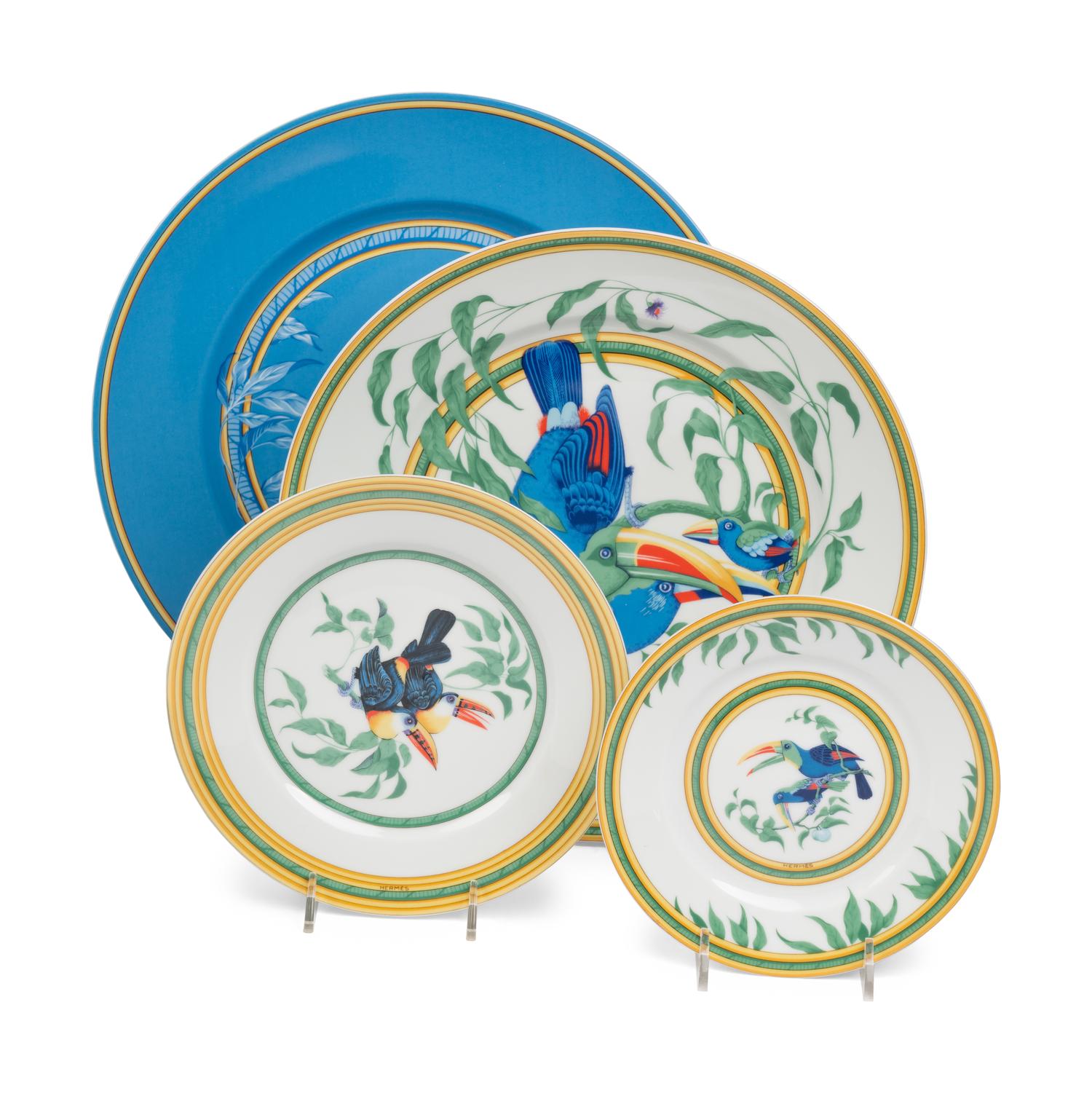 An Hermès Toucans Porcelain Dinner Service