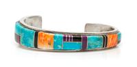 A Silver and Multigem Cuff Bracelet, 21.10 dwts.