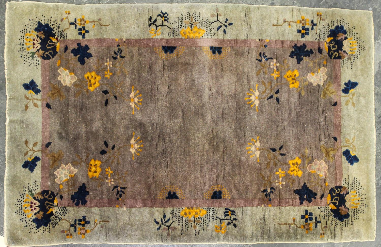 A Chinese Wool Rug 4 feet 10 inches x 3 feet 1 inch. — 1ST HALF 20TH CENTURY