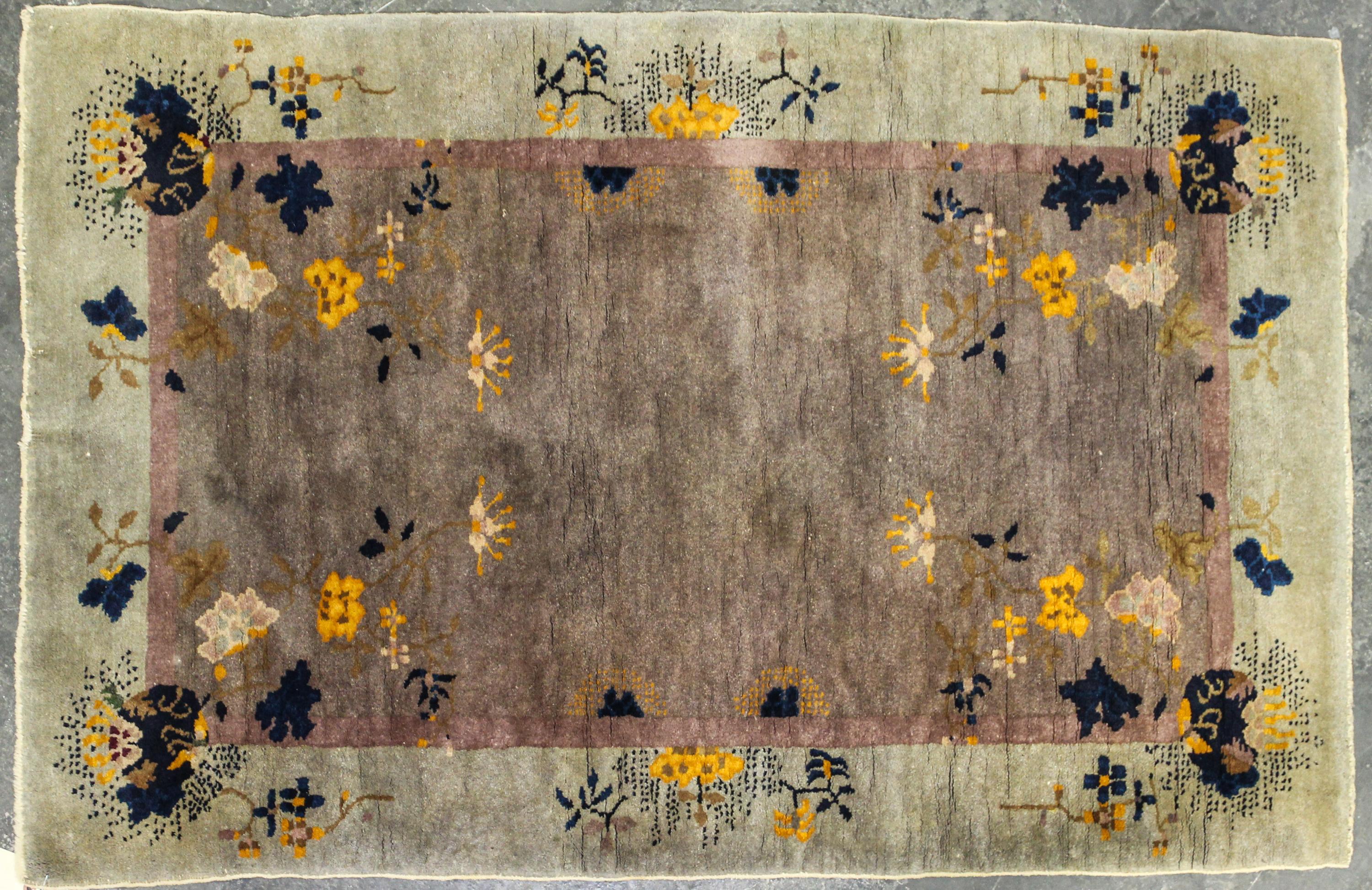 A Chinese Wool Rug 4 feet 10 inches x 3 feet 1 inch. — 1ST HALF 20TH CENTURY