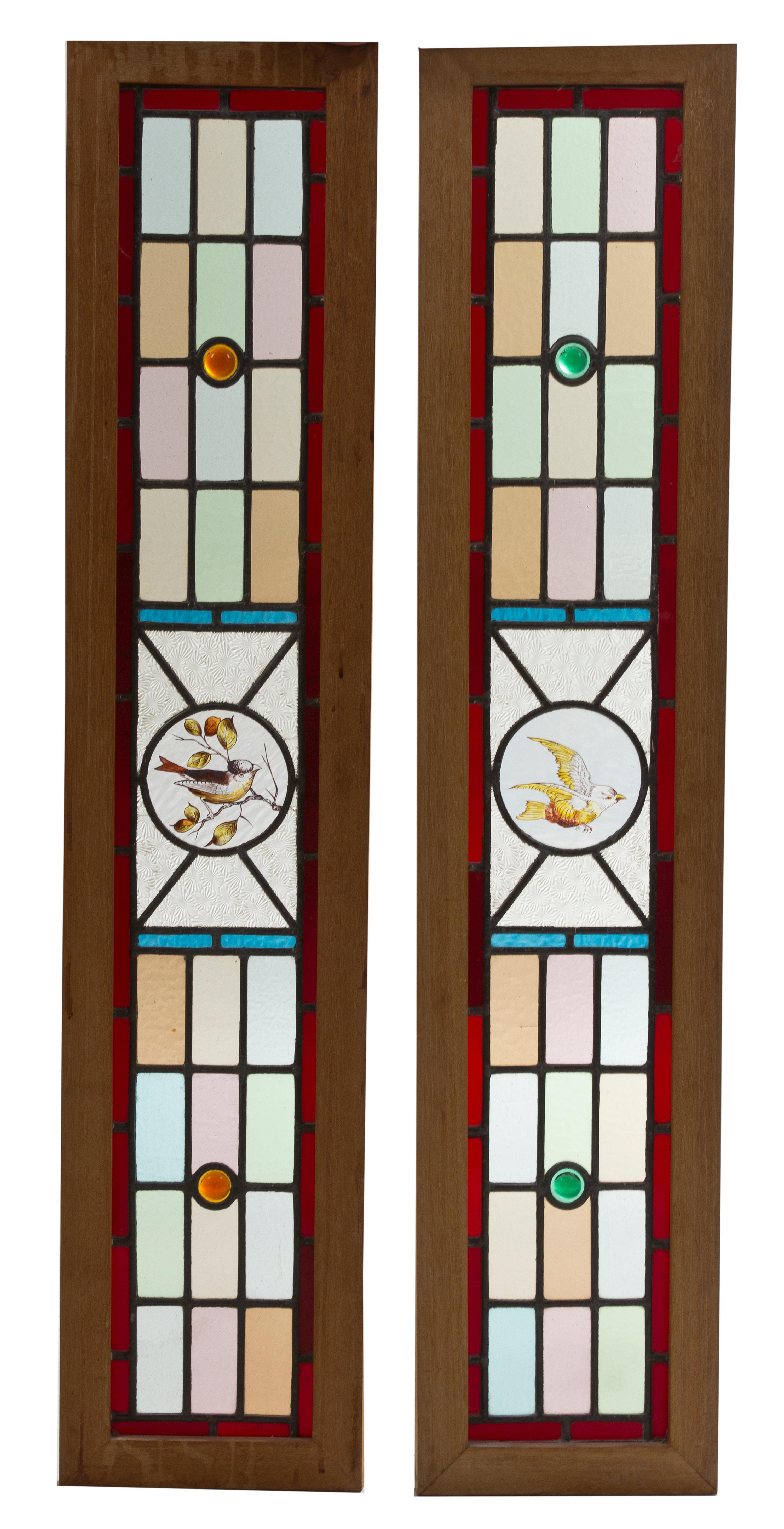 A Pair of Leaded and Stained Glass Windows, Height 40 x width 6 inches.