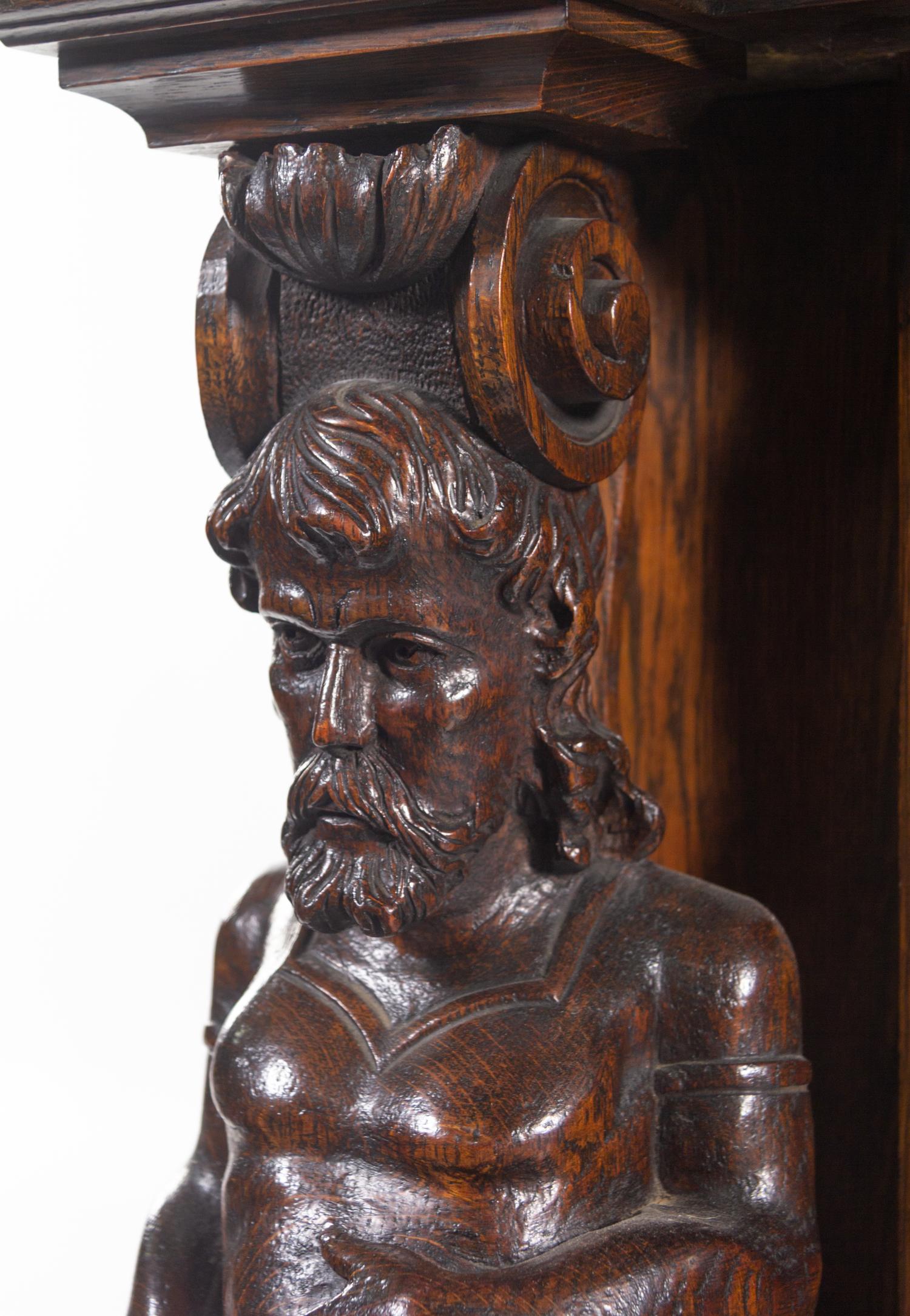 An R.J. Horner Carved Oak Man of the Mountain Serving Cabinet