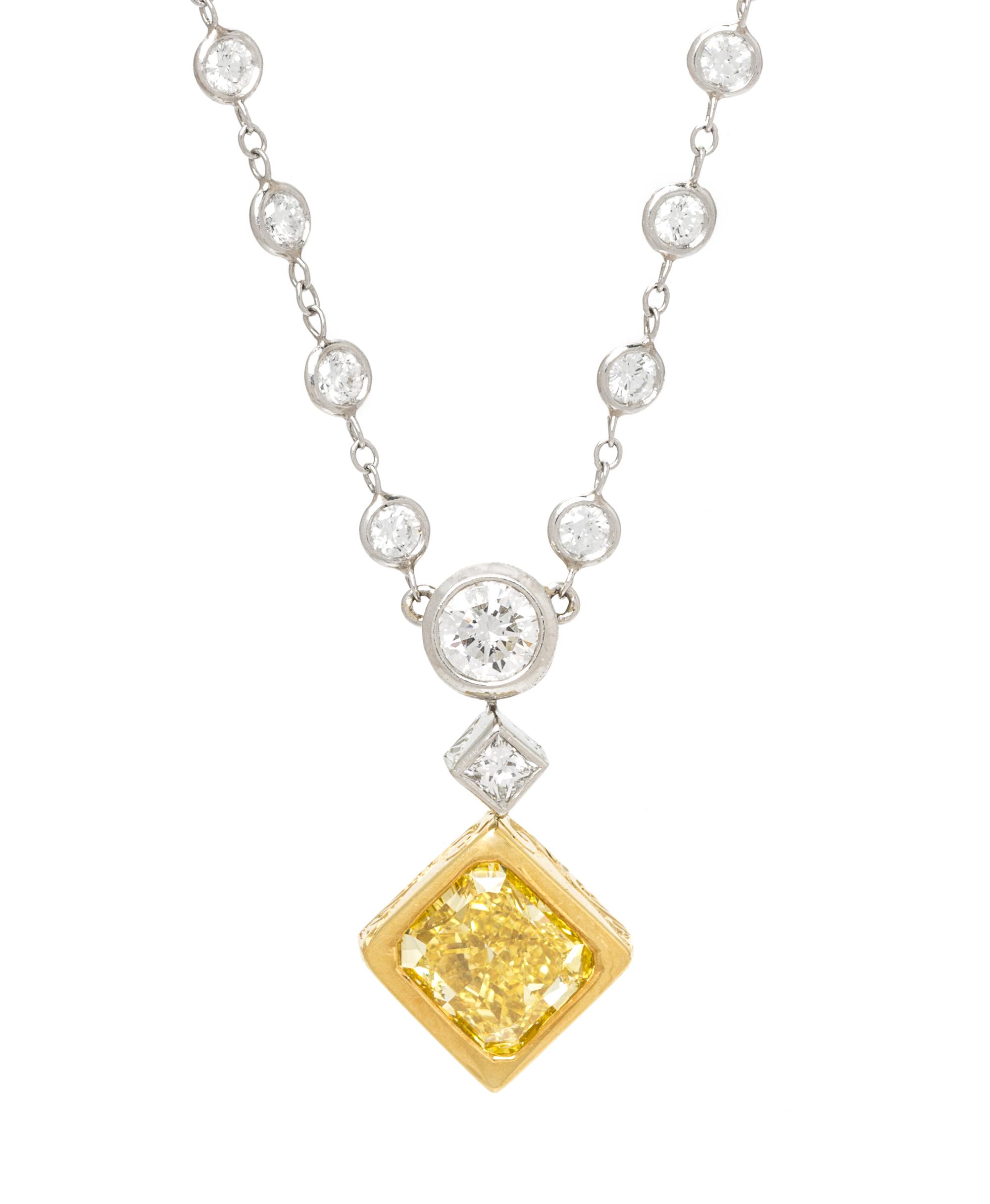 A Platinum, 18 Karat Yellow Gold, Fancy Vivid Yellow Diamond and Diamond Necklace, Michael Beaudry, 9.25 dwts.