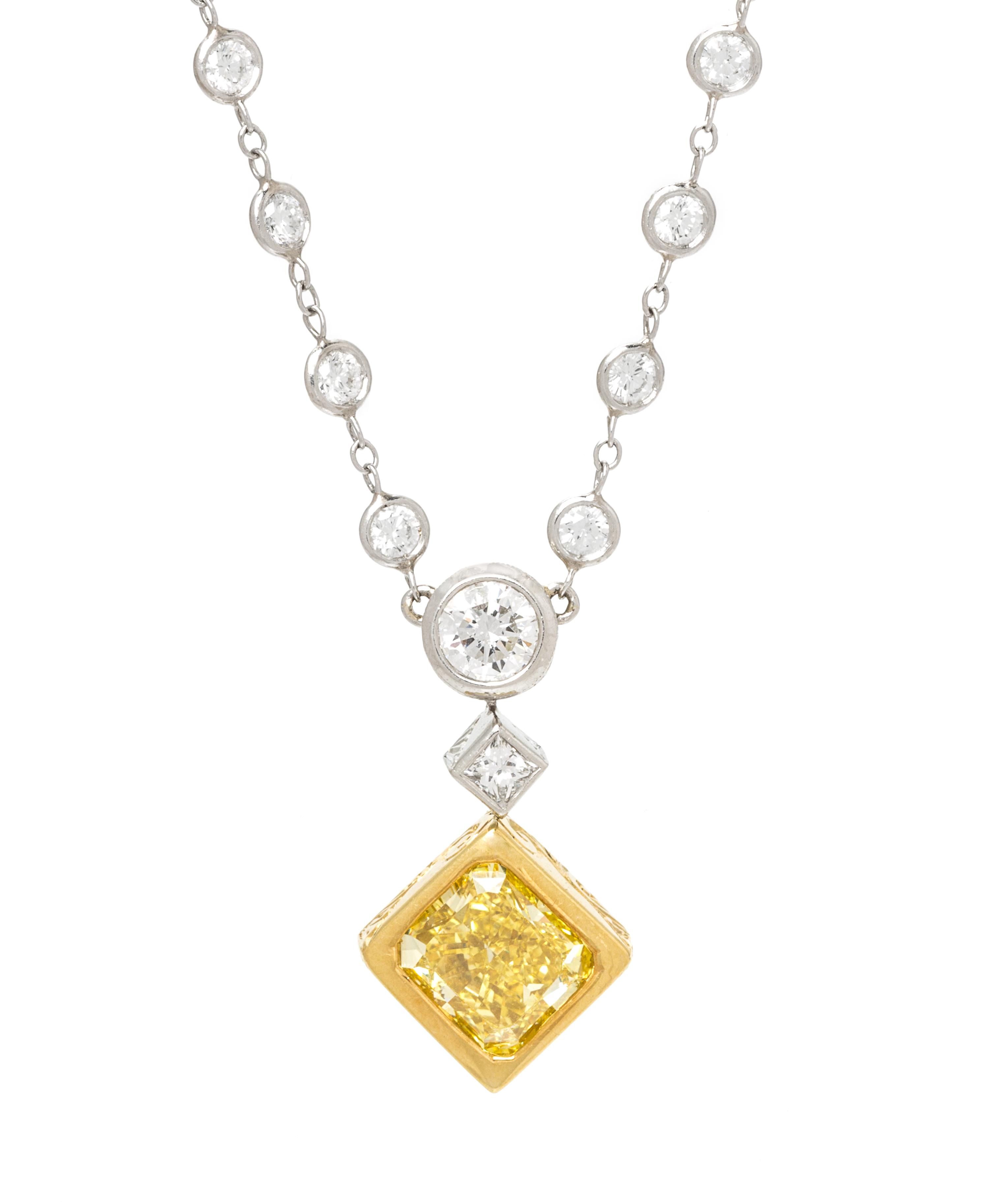 A Platinum, 18 Karat Yellow Gold, Fancy Vivid Yellow Diamond and Diamond Necklace, Michael Beaudry, 9.25 dwts.