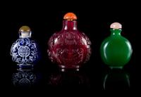 Three Glass Snuff Bottles Height of tallest 3 inches.
