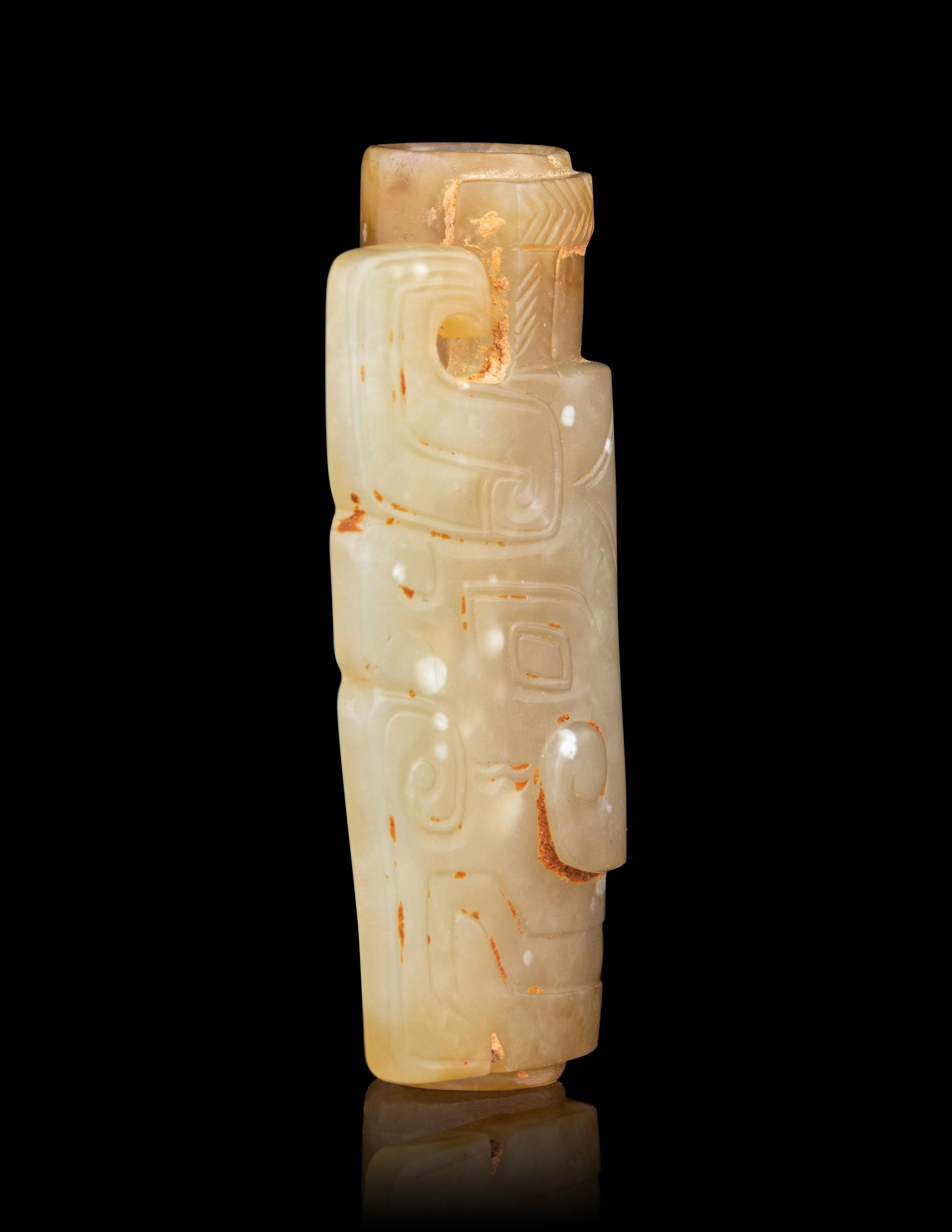 A Small Archaistic Jade Mask-Form Ornament