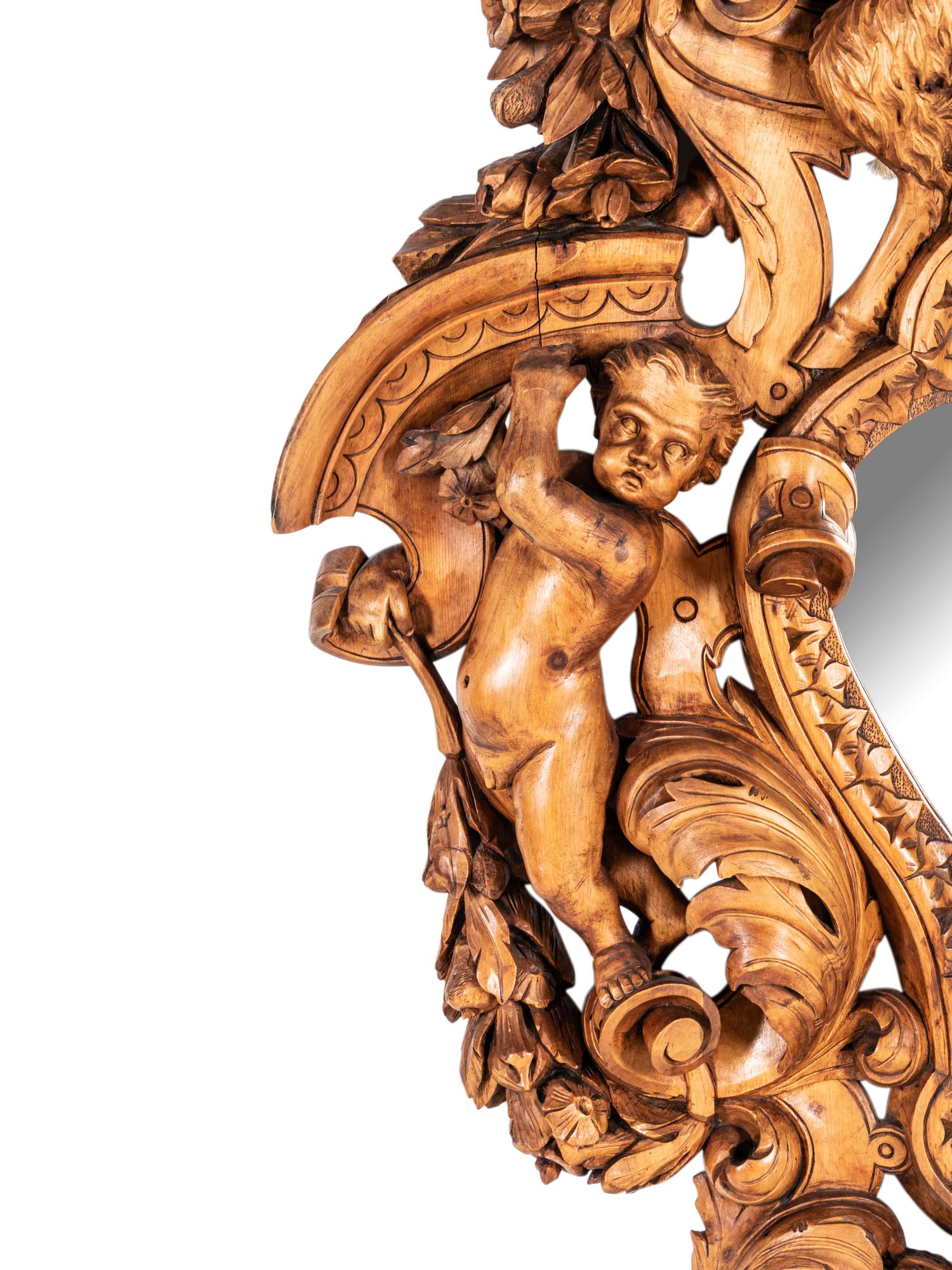 A Large Italian Carved Walnut Mirror in the Manner of Valentino Panciera Besarel