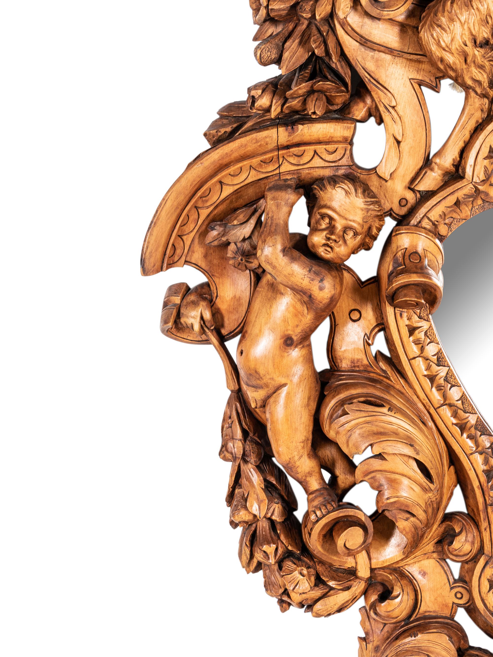 A Large Italian Carved Walnut Mirror in the Manner of Valentino Panciera Besarel