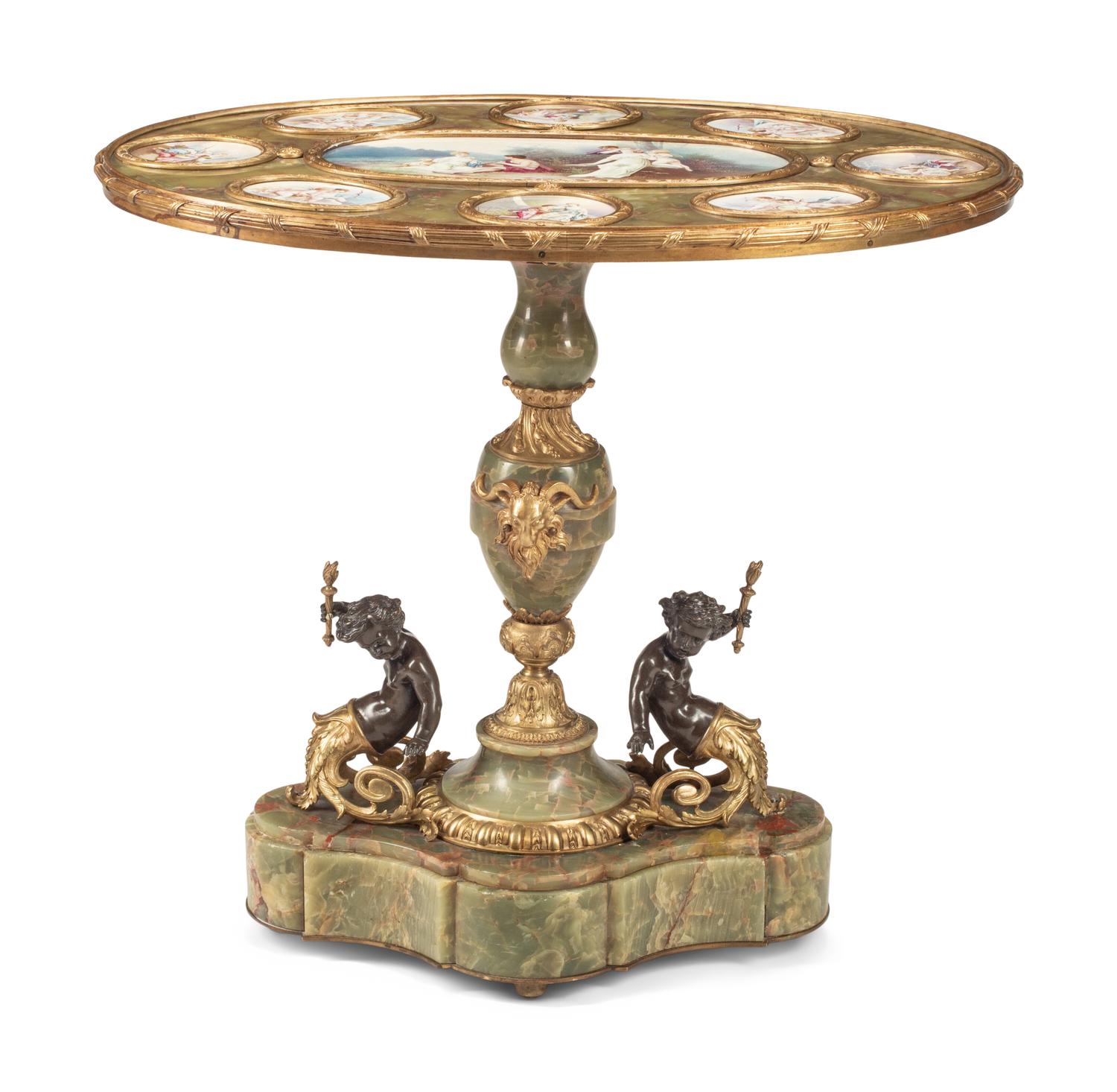 A Napoleon III Gilt Bronze Mounted Onyx and Porcelain Plaque-Inset Table