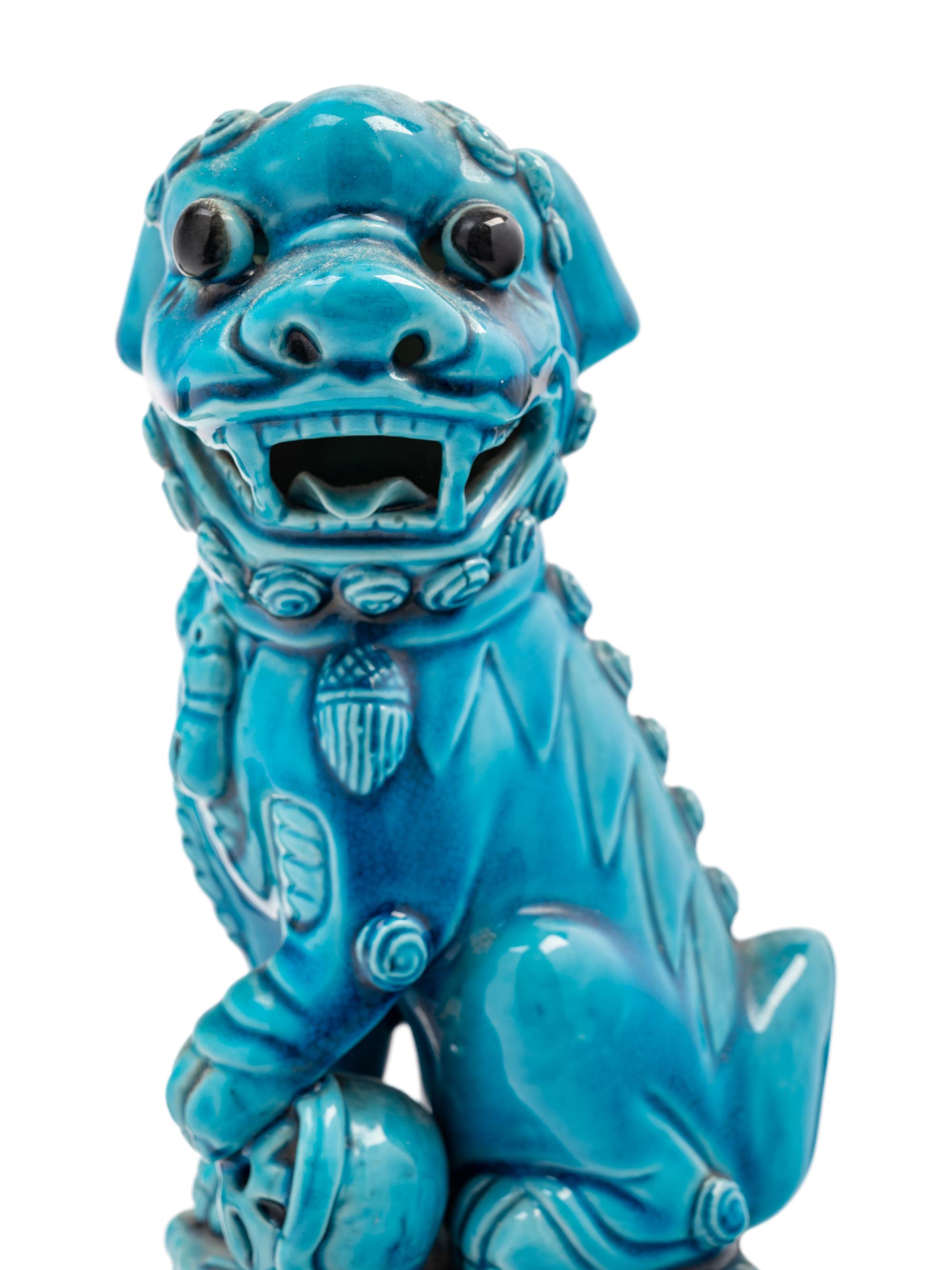 Three Chinese Porcelain Figures of Fu Lions