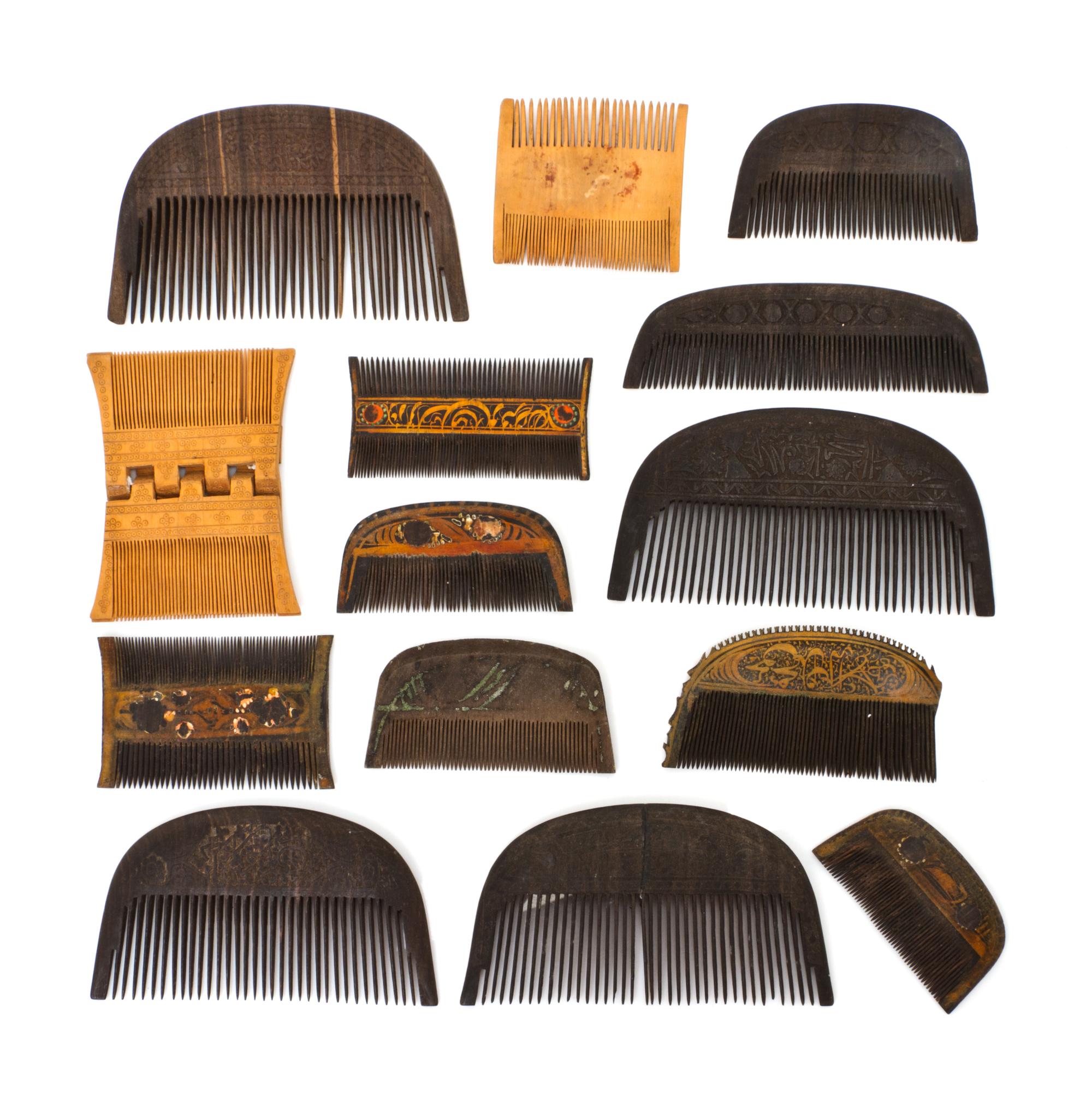 Fourteen Middle Eastern Carved Wood Hair Combs, Width of longest 5 7/8 inches.