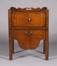 A George III Mahogany Commode Cabinet, Height 31 x width 23 1/4 x depth 17 3/4 inches.