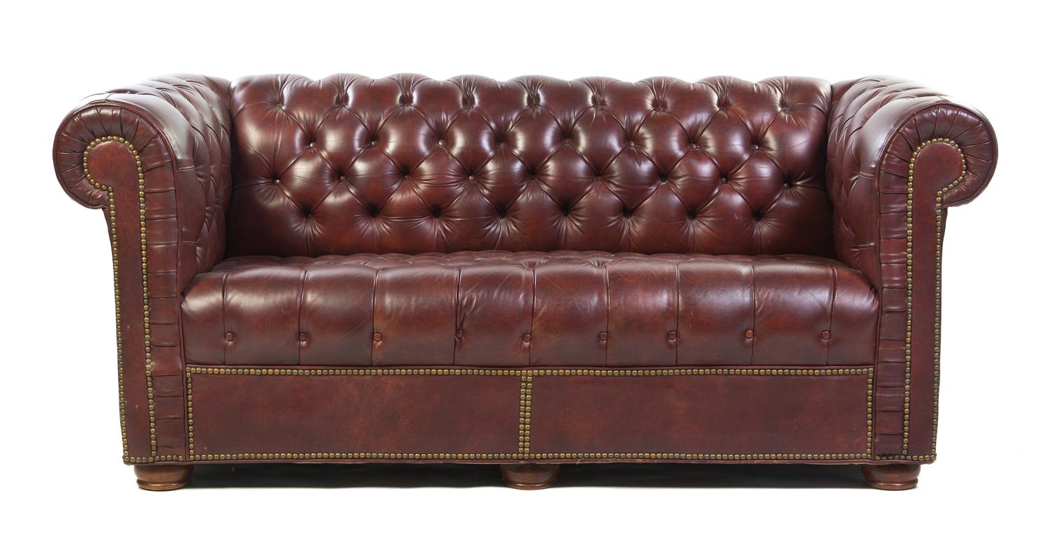 A Chesterfield Button Tufted Faux Leather Upholstered Sofa, Width 70 inches.