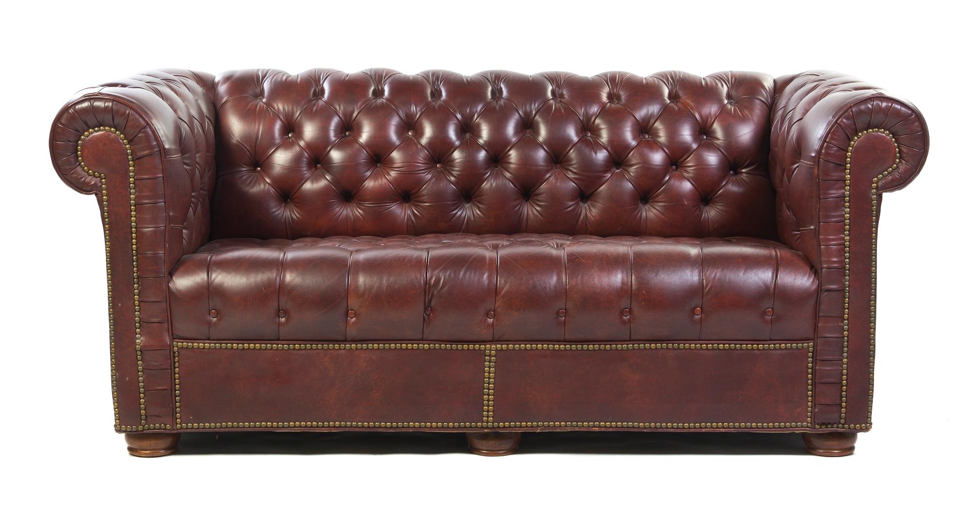A Chesterfield Button Tufted Faux Leather Upholstered Sofa, Width 70 inches.