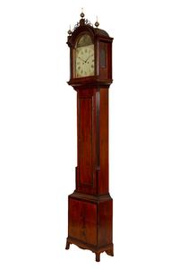 A Federal Carved, Inlaid and Figured Mahogany Tall Case Clock