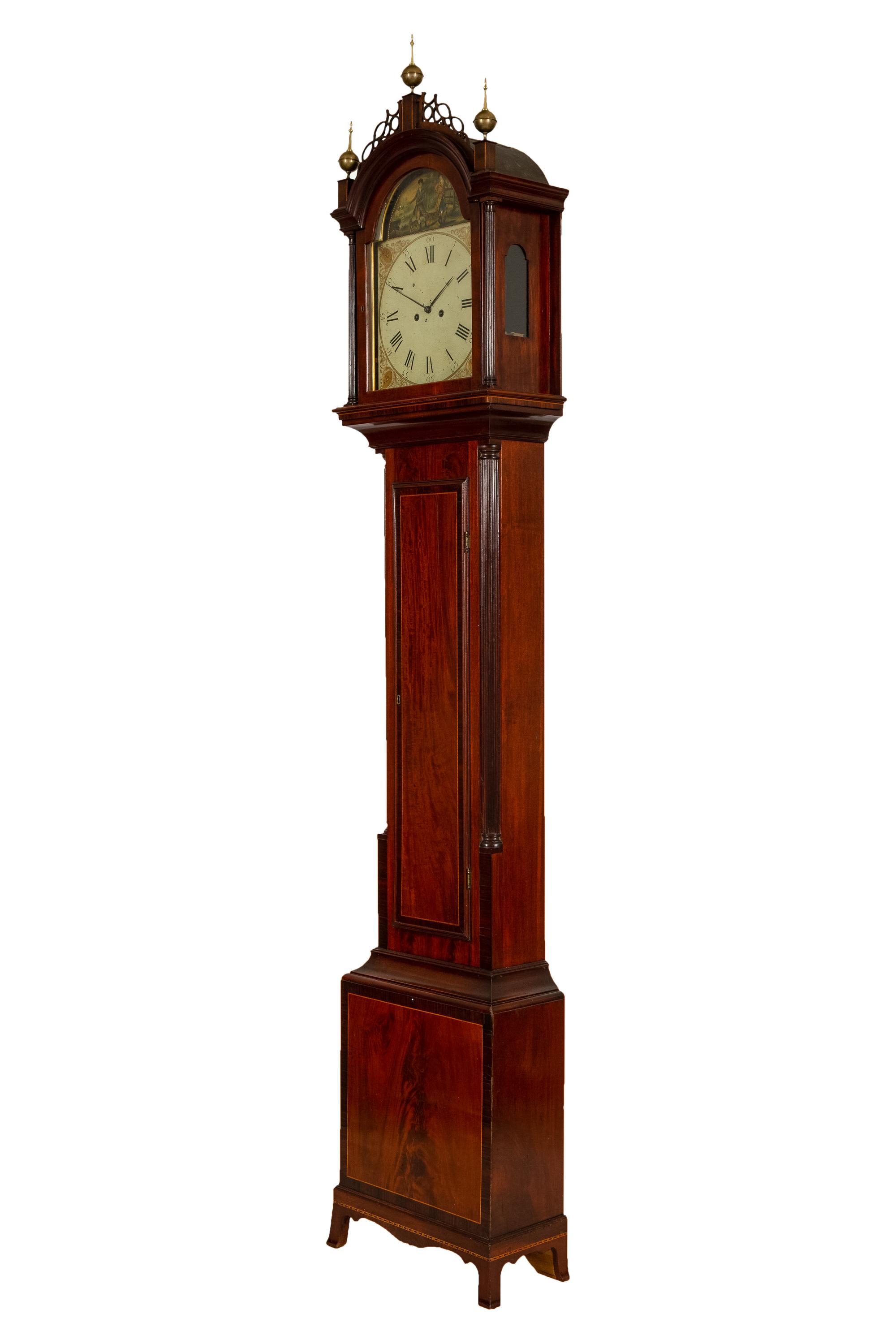 A Federal Carved, Inlaid and Figured Mahogany Tall Case Clock