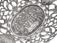 A Group of Six Continental and American Silver Repousse and Reticulated Articles