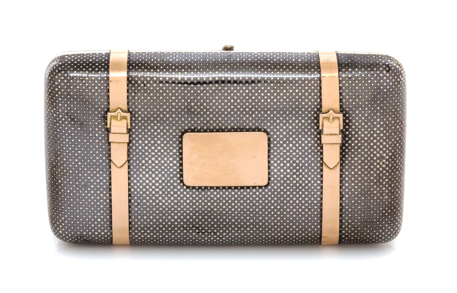 A Russian Niello Silver Cigar Case, Mark of S. Stroganov, assay mark of V. Savinsky, Moscow, 1867, the exterior with a niello grid patt