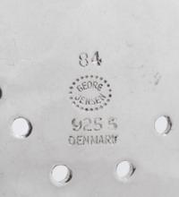 A Georg Jensen Silver Blossom Pattern Tea Strainer