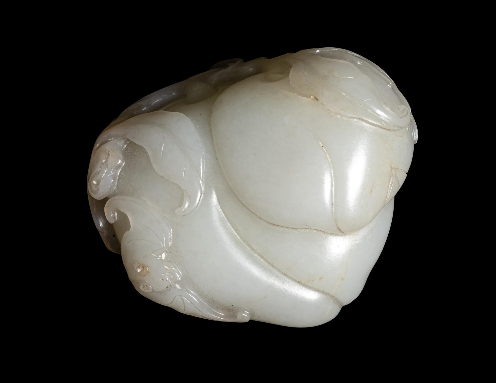 A Carved White Jade 'Peaches and Bat' Group