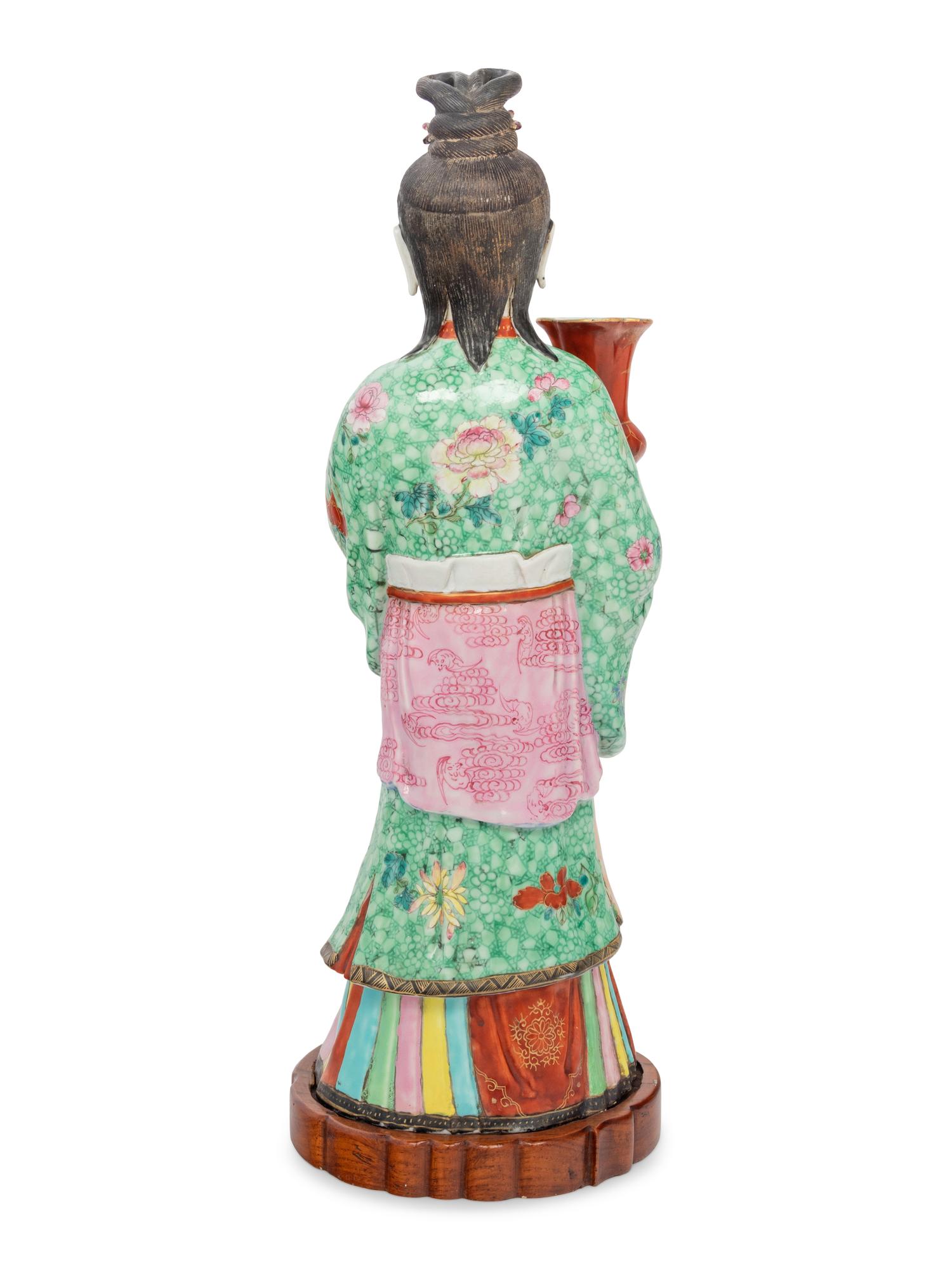 A Chinese Export Figure of a Standing Court Maiden
