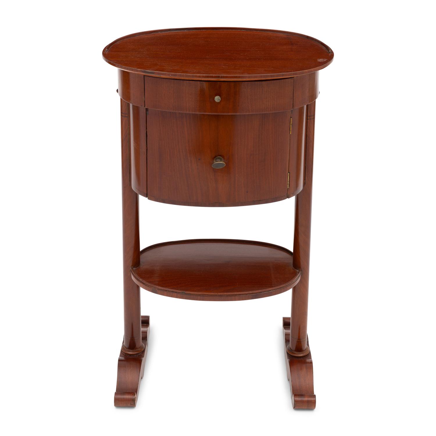 An Empire Style Mahogany Drum Table