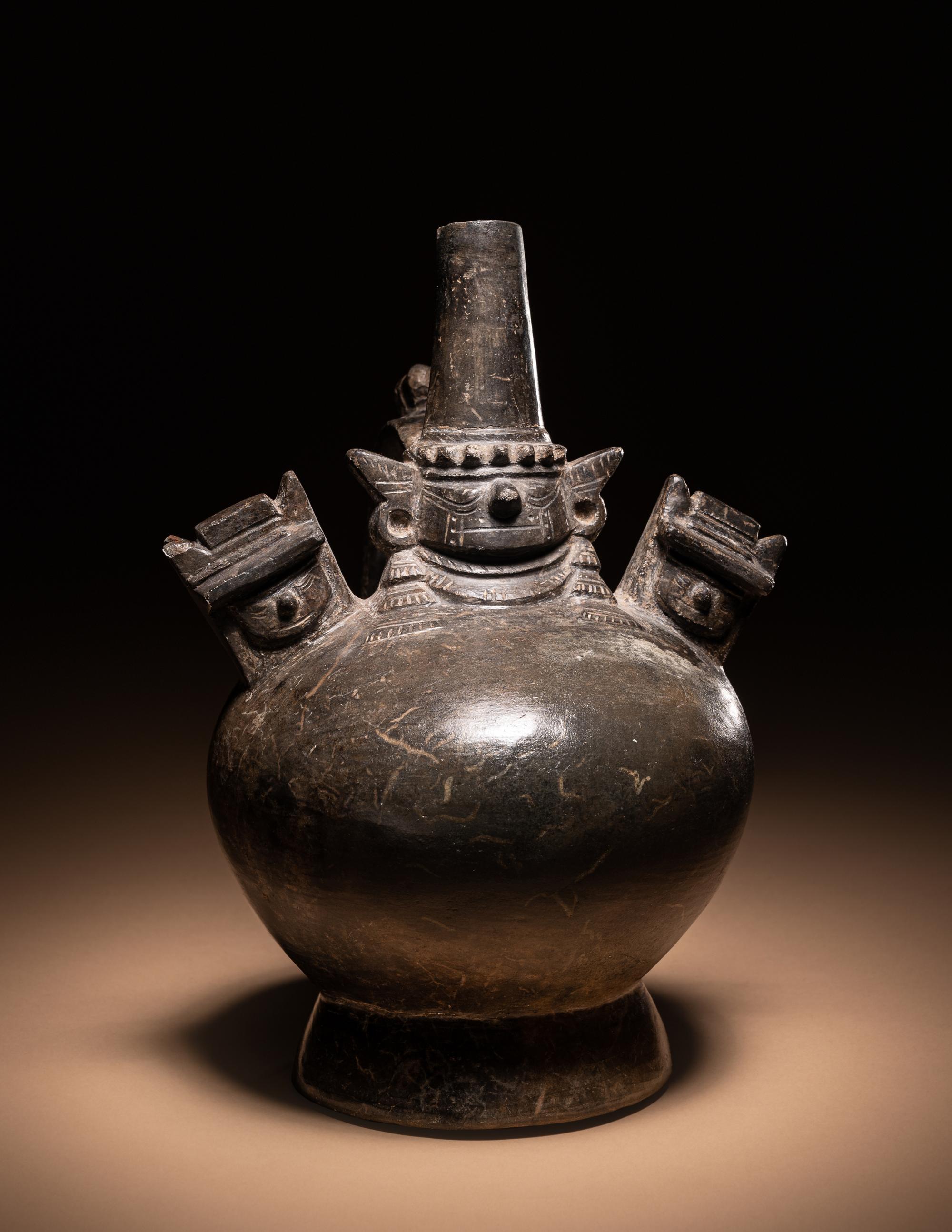 A Sican Blackware Stirrup Vessel