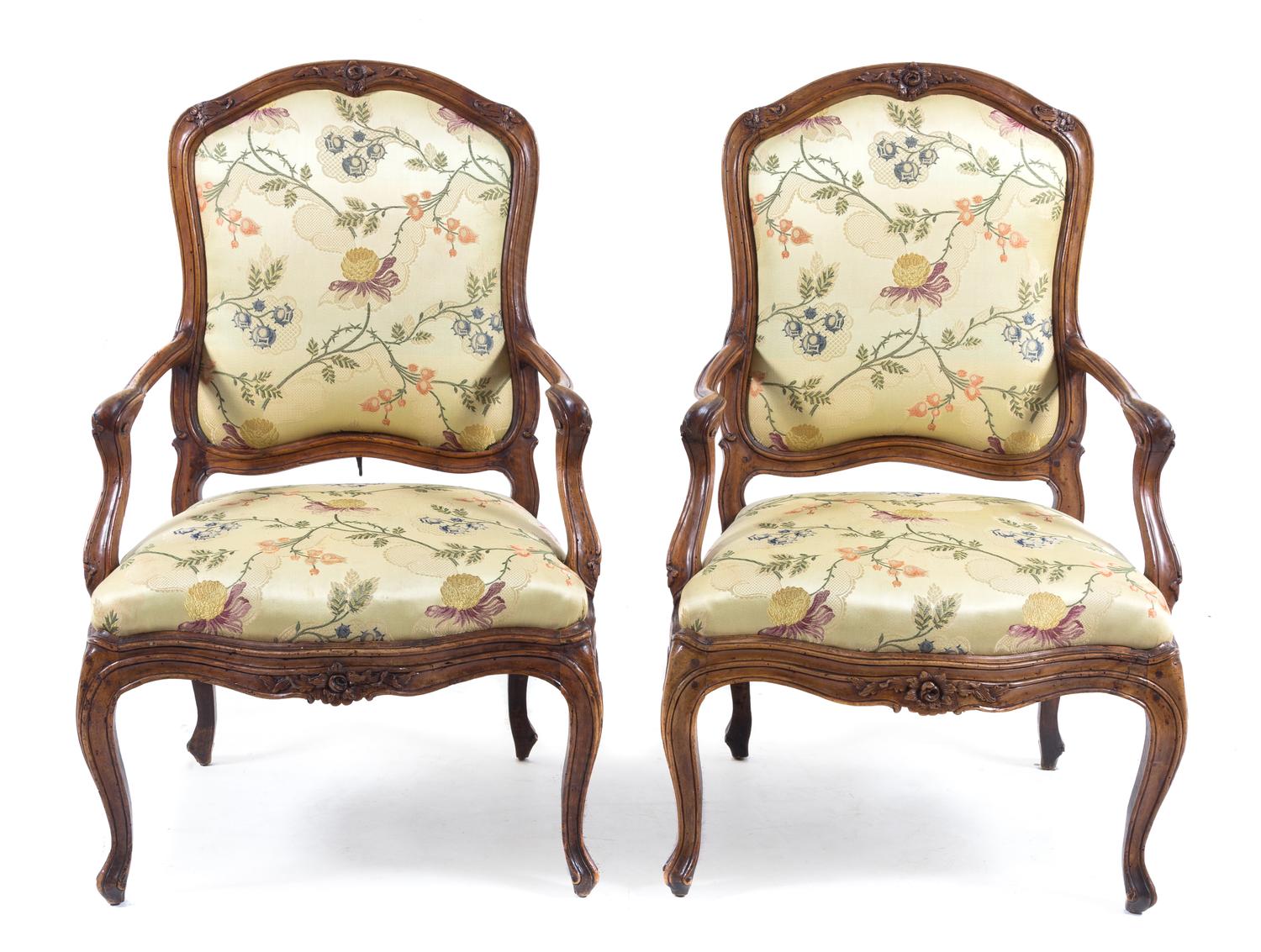A Pair of Louis XV Walnut Fauteuils Height 41 1/2 inches. — 18TH CENTURY