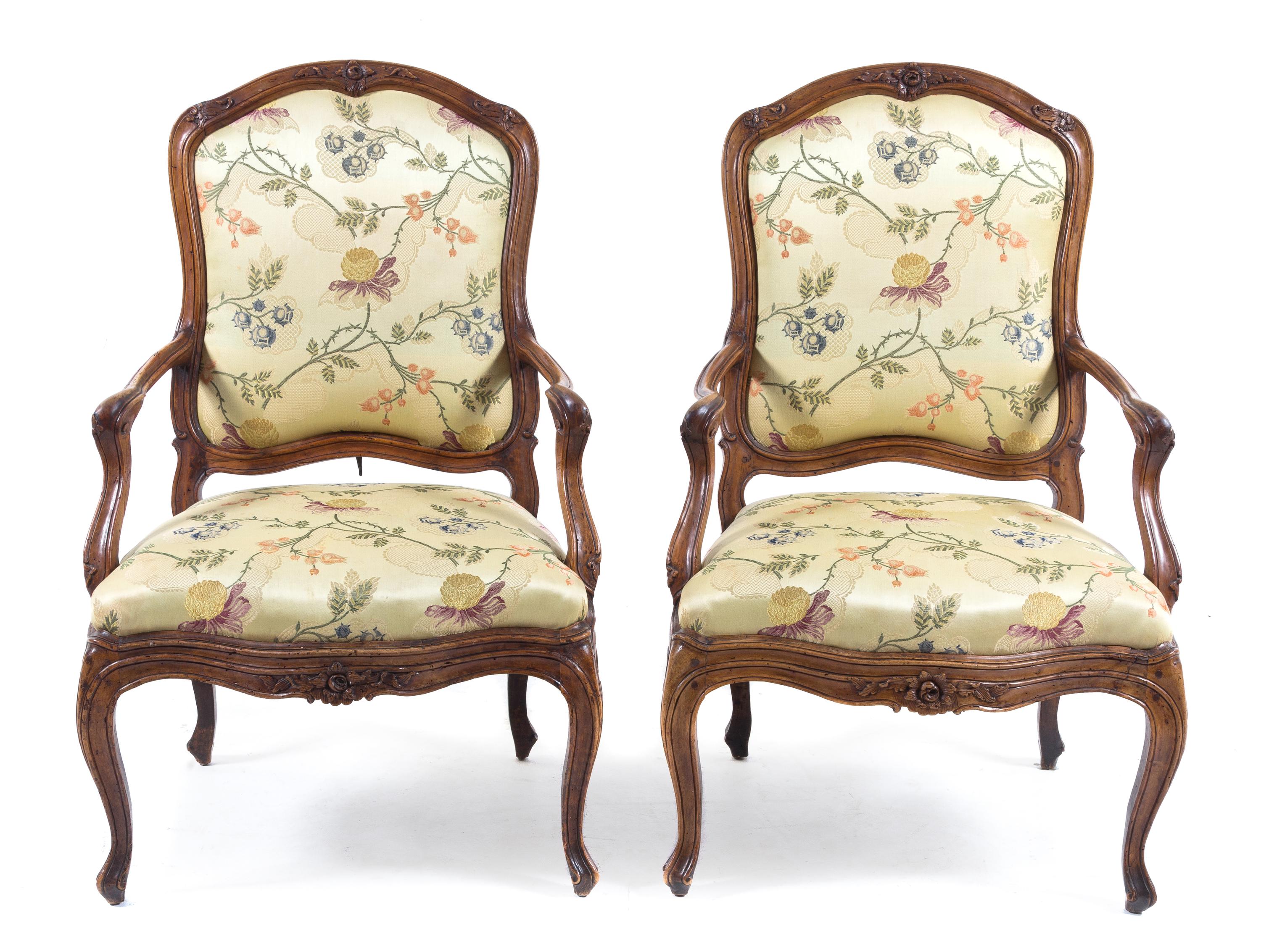 A Pair of Louis XV Walnut Fauteuils Height 41 1/2 inches. — 18TH CENTURY