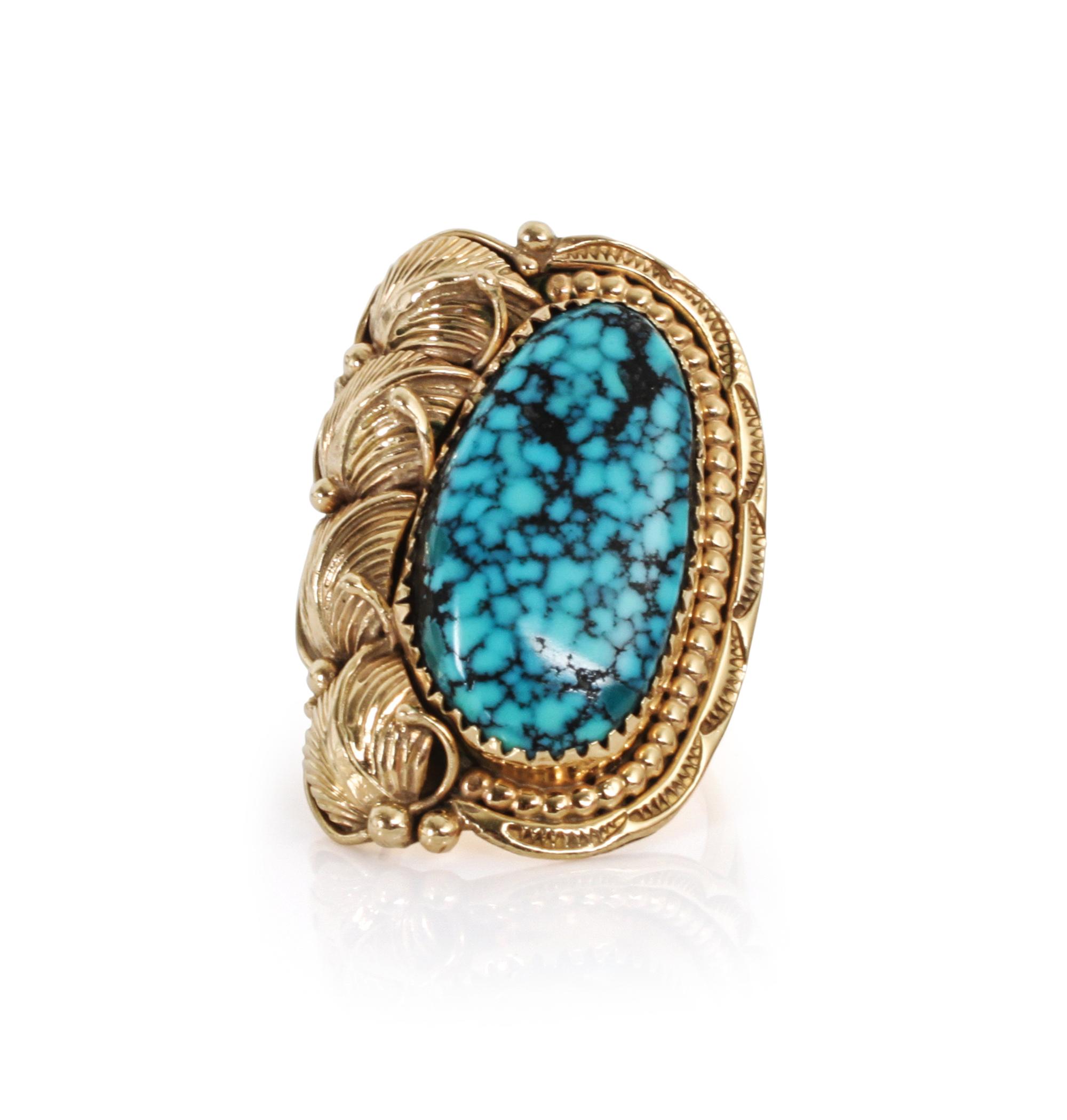 A 14 Karat Gold and Turquoise Ring