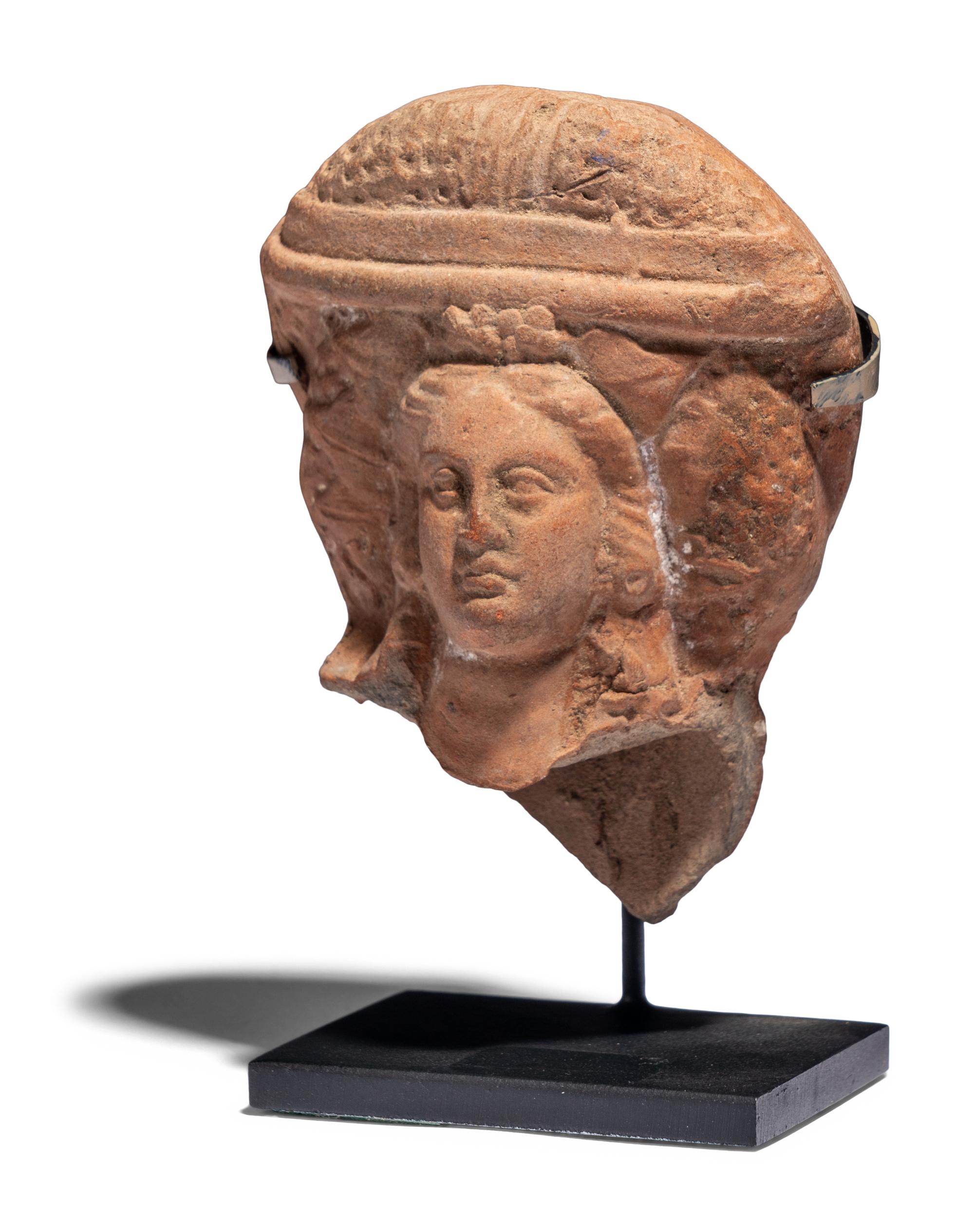 A Hellenistic Terracotta Head of a Goddess