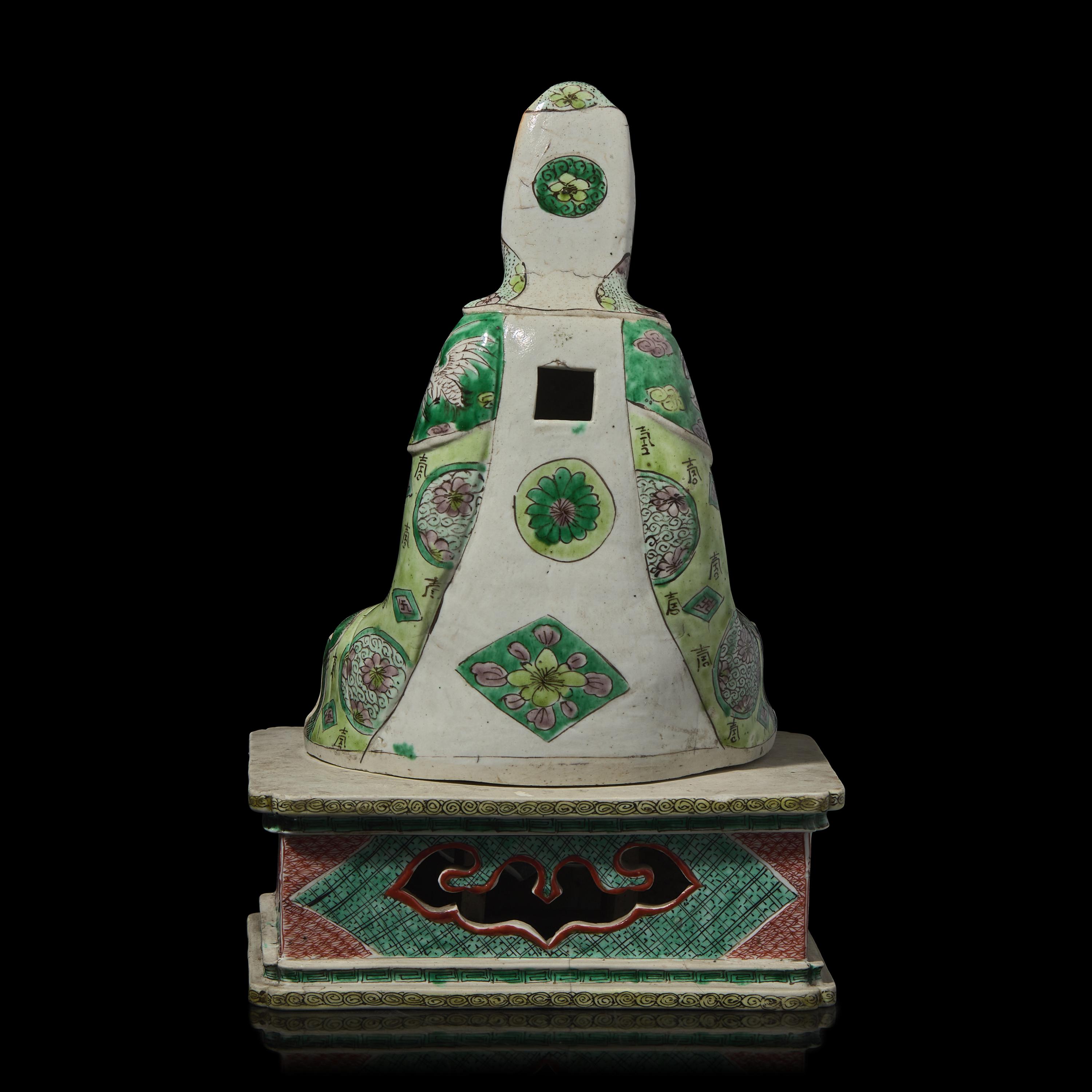 A Chinese Enameled Biscuit Figure of Guanyin Seated, with Associated Stand, Qing Dynasty 清 素三彩觀音坐像 帶木座