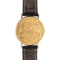 BAUME & MERCIER, YELLOW GOLD HIDDEN DIAL COIN WATCH