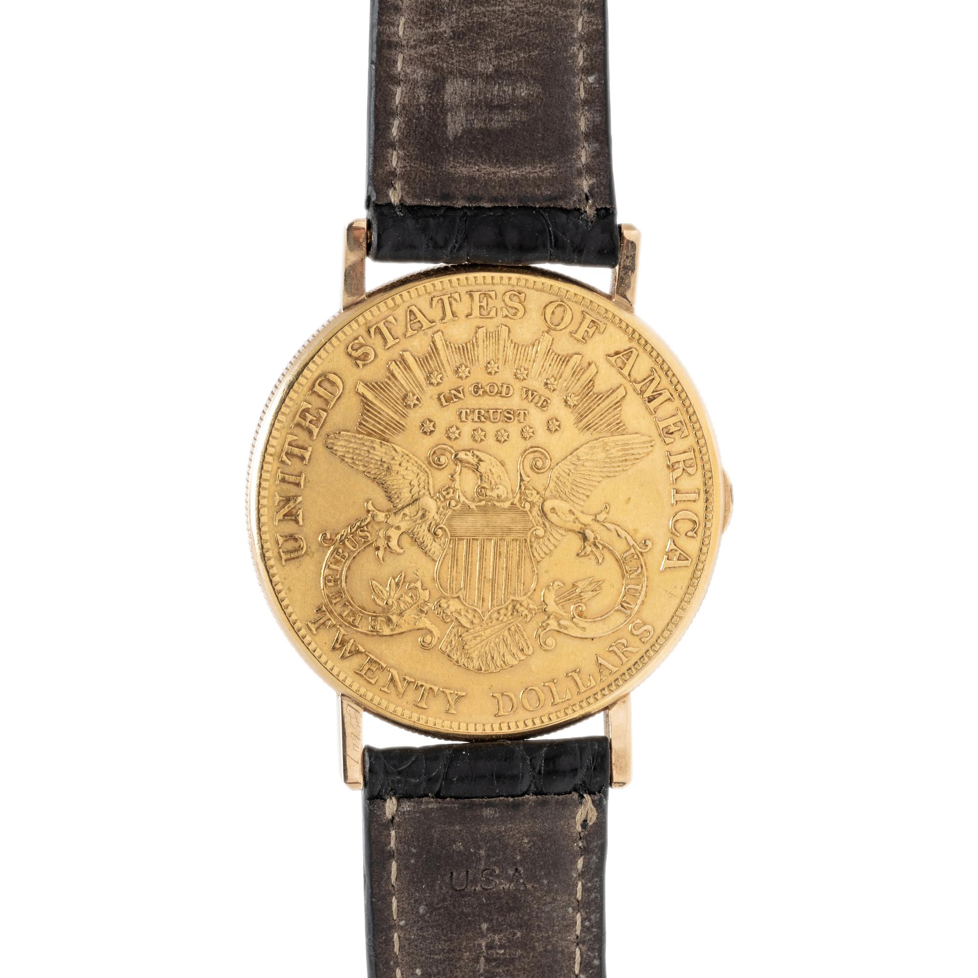 BAUME & MERCIER, YELLOW GOLD HIDDEN DIAL COIN WATCH