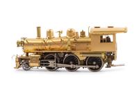 A Group of Four Brass Locomotives and Three Tenders