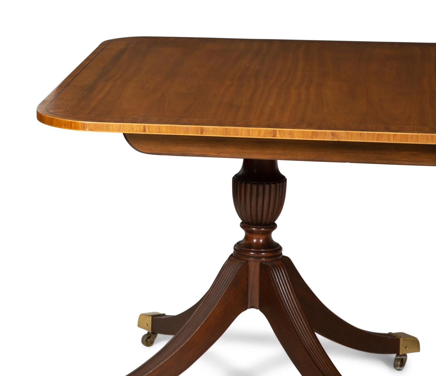 A George III Style Mahogany Double-Pedestal Extension Dining Table