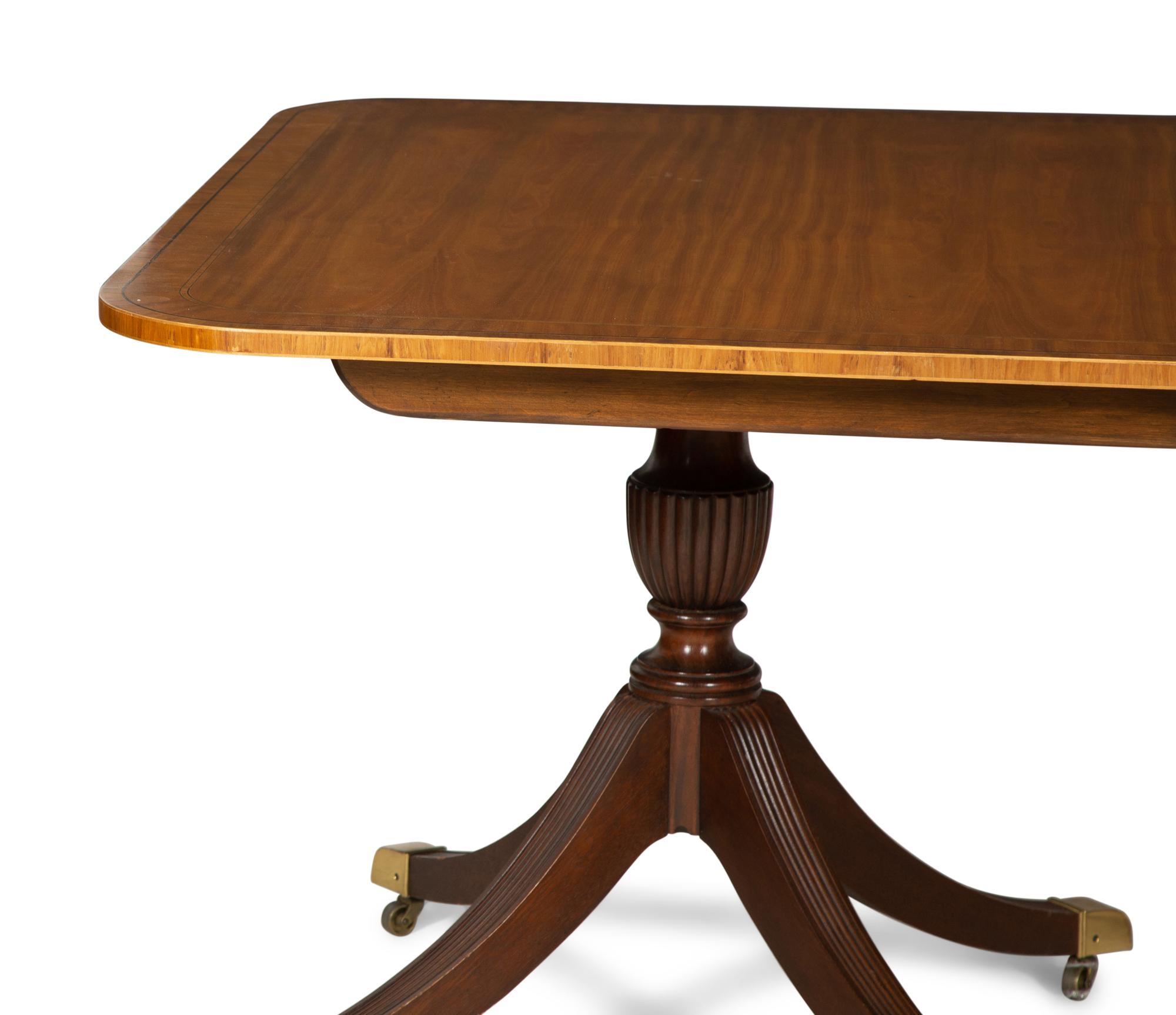 A George III Style Mahogany Double-Pedestal Extension Dining Table