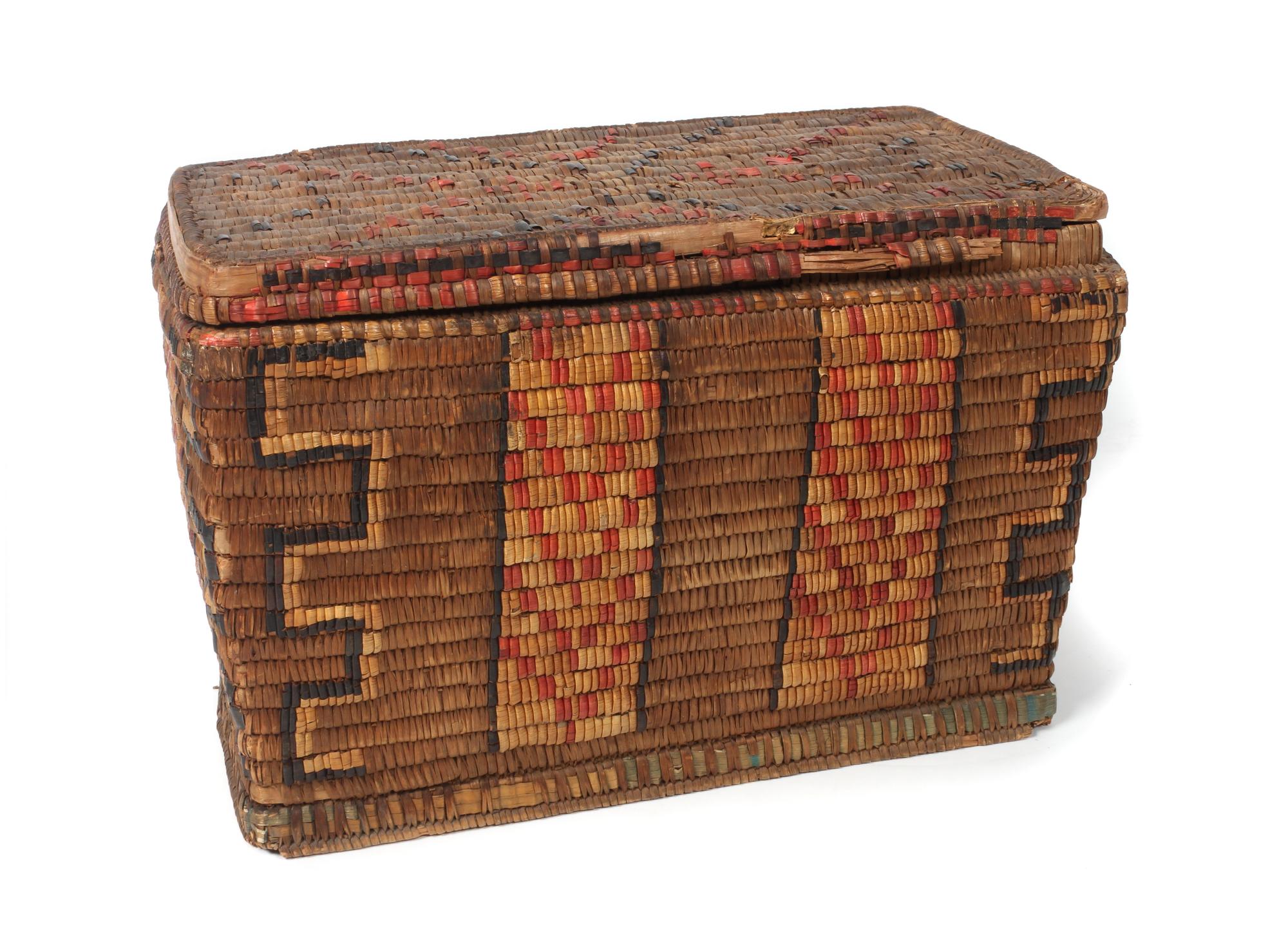A Salish Cedar Basket Trunk Height 11 1/2 x width 18 x depth 10 1/2 inches.