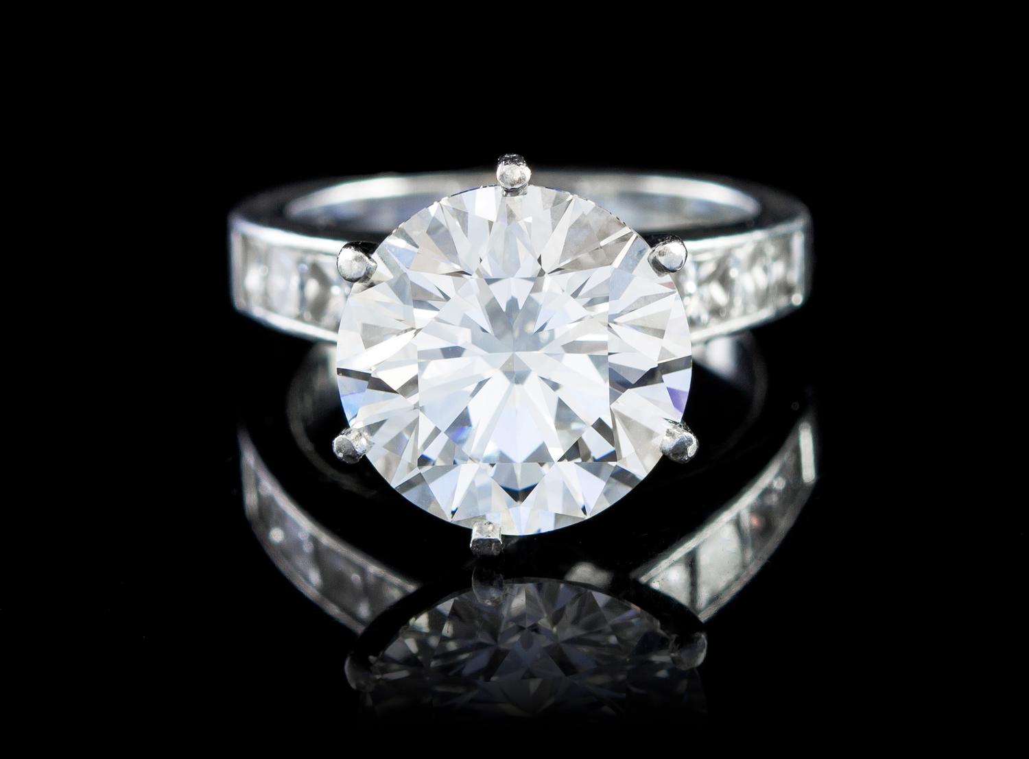 A Fine Platinum and Round Brilliant Cut Diamond Ring, 6.60 dwts.