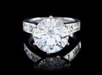 A Fine Platinum and Round Brilliant Cut Diamond Ring, 6.60 dwts.