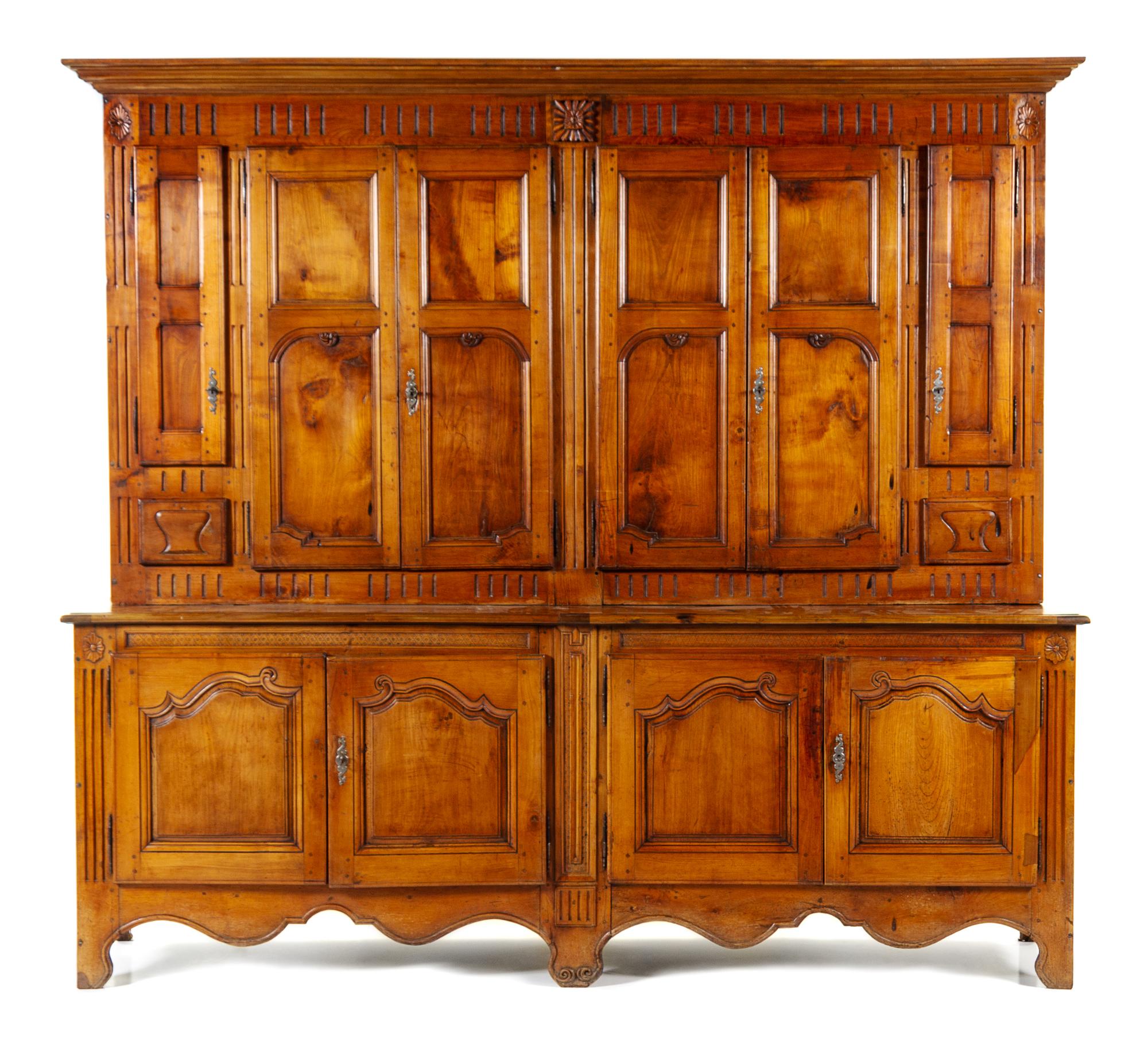 A Louis XV Provincial Walnut Meuble a Deux Corps Height 99 3/8 x width 108 1/4 x depth 21 1/4 inches. — LATE 18TH/EARLY 19TH CENTURY