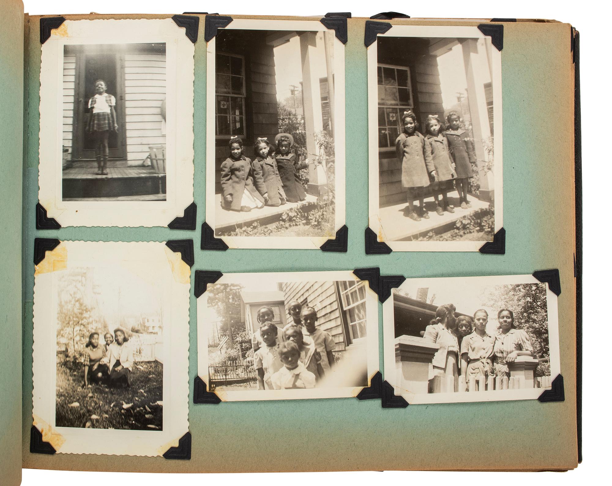 [EARLY PHOTOGRAPHY]. Album recording the early life of Juanita Thompson, an African American woman who grew up in Jamaica, NY, incl. images of her integrated neighborhood and summer camp. Ca 1920s-1950s.