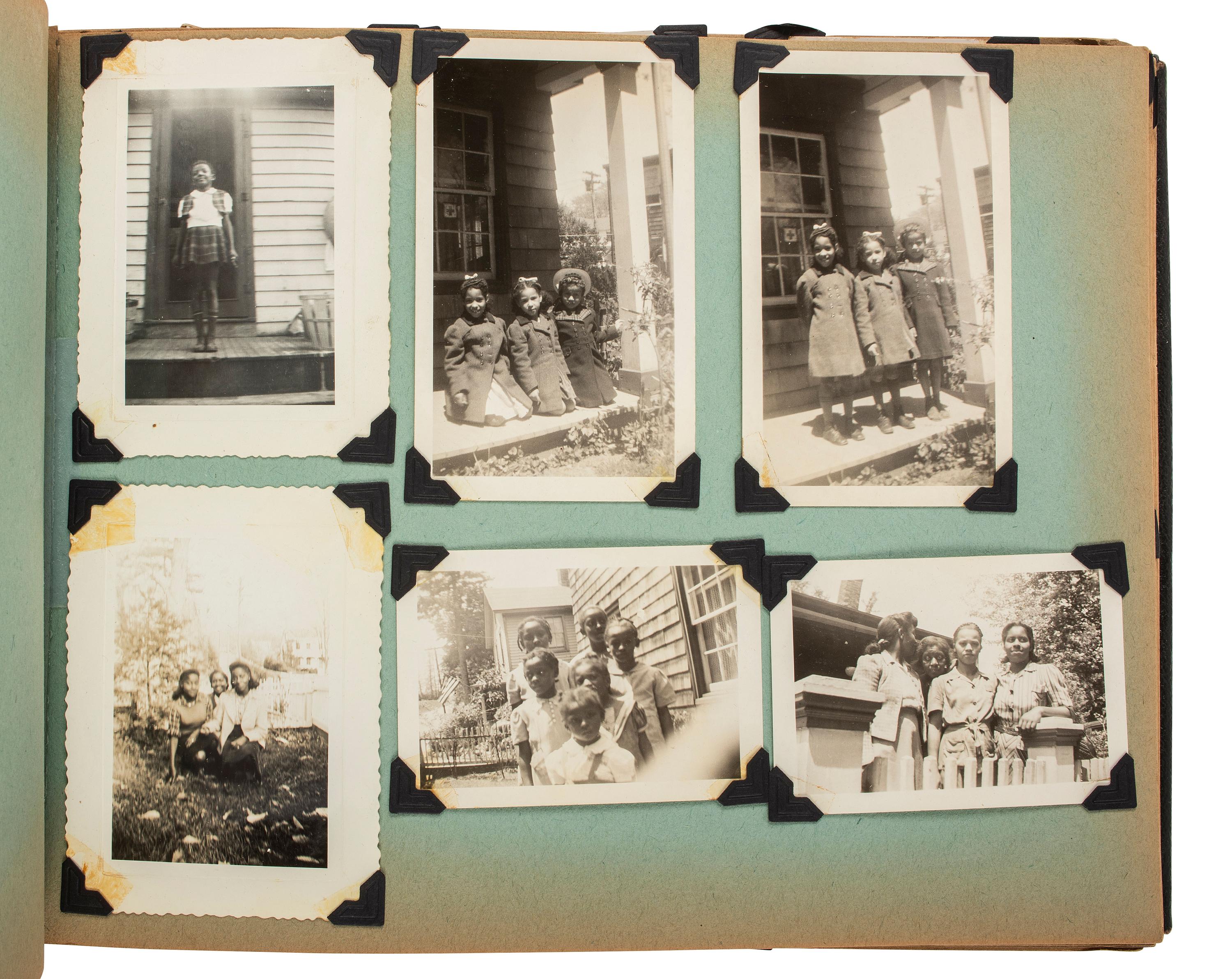[EARLY PHOTOGRAPHY]. Album recording the early life of Juanita Thompson, an African American woman who grew up in Jamaica, NY, incl. images of her integrated neighborhood and summer camp. Ca 1920s-1950s.
