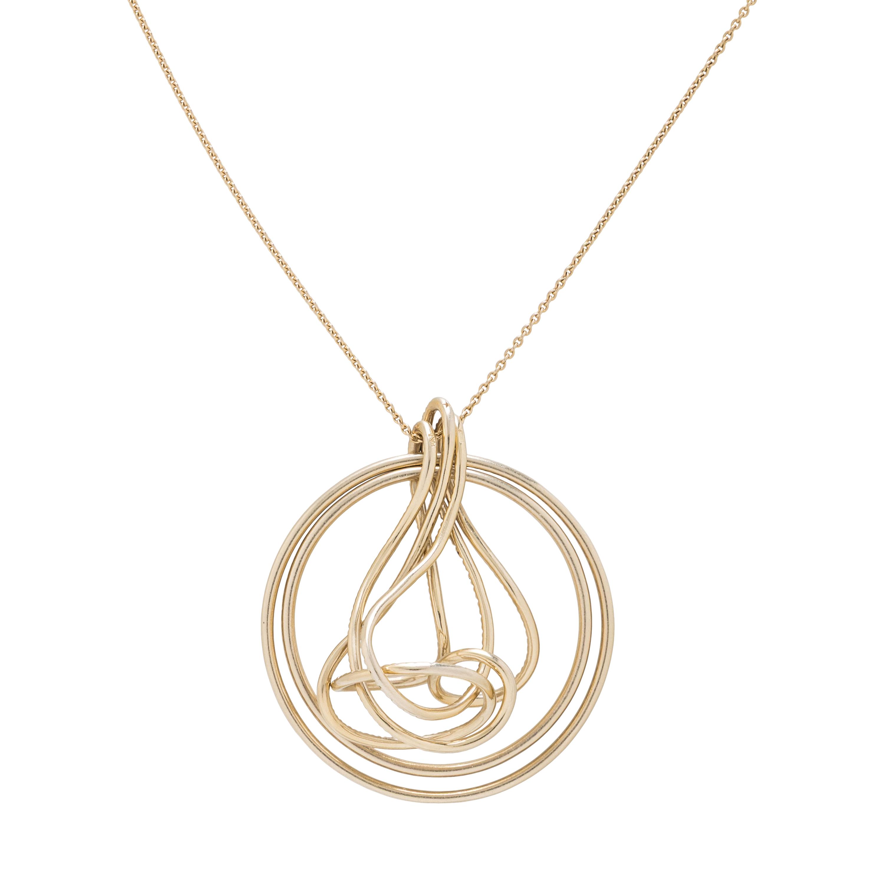YELLOW GOLD AND DIAMOND SCULPTURAL PENDANT NECKLACE