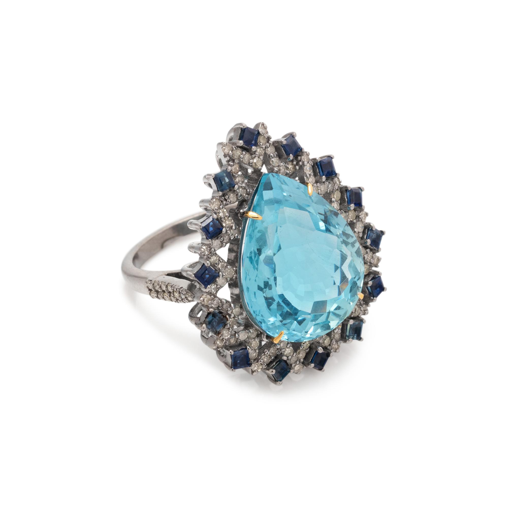 AQUAMARINE, SAPPHIRE AND DIAMOND RING