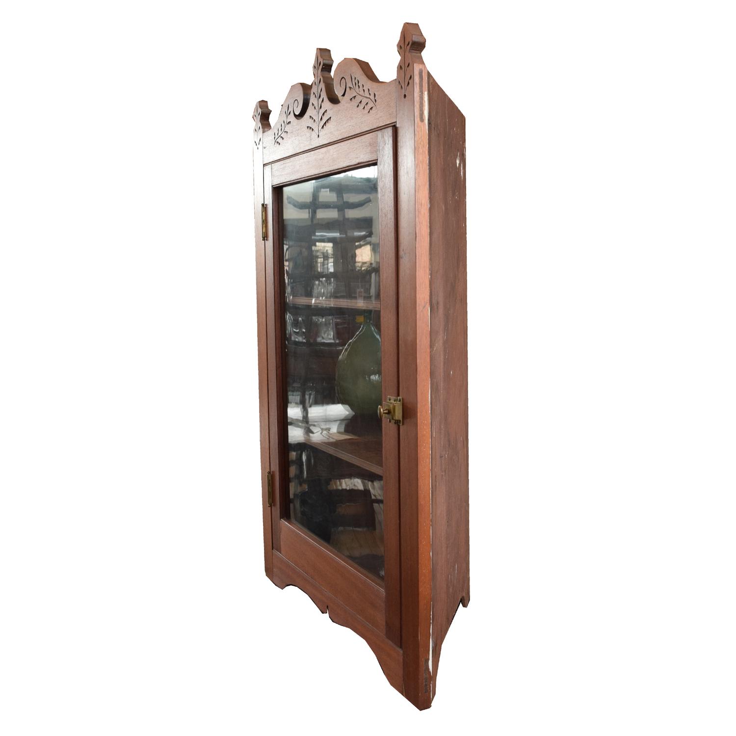 A Wall Mounted Corner Cabinet 26.25" W x 13" D x 43.25" H — United States, 19th Century