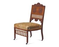 An Aesthetic Movement Carved Teak Side Chair