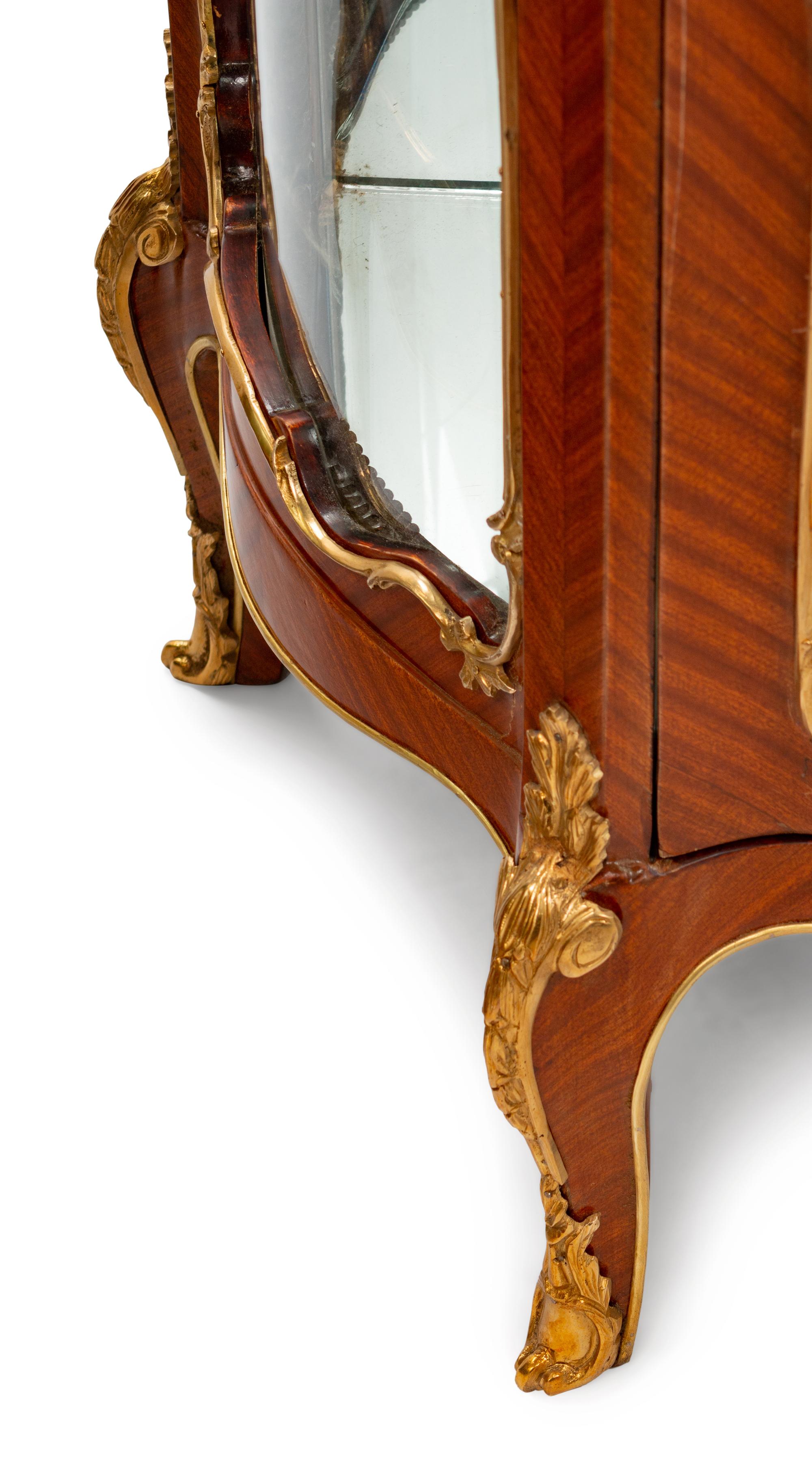 A Pair of Louis XV Style Gilt-Bronze-Mounted Kingwood Vitrine Cabinets