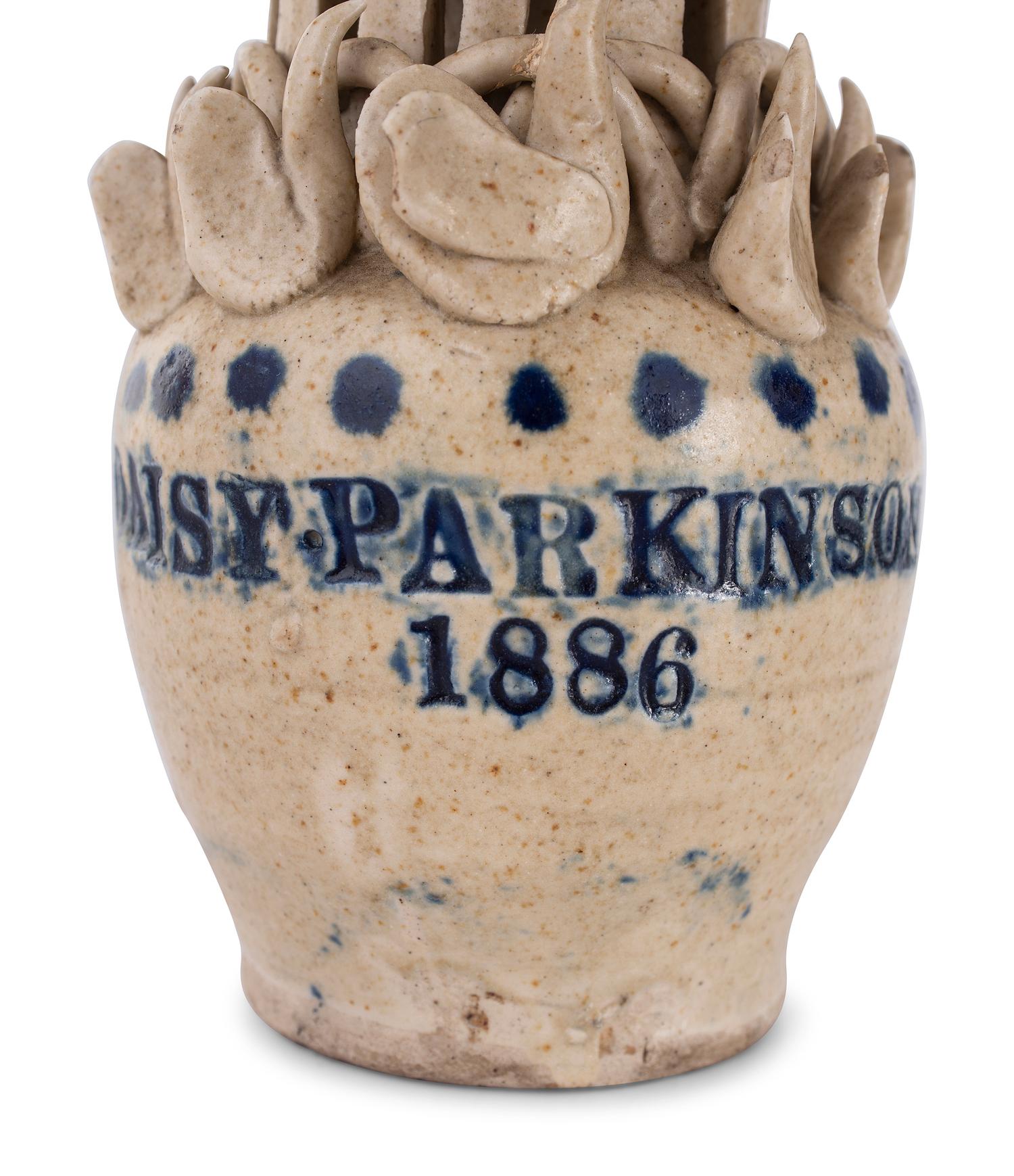 A Pair of Cobalt Decorated Stoneware Puzzle Banks