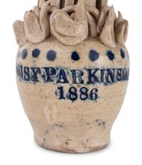A Pair of Cobalt Decorated Stoneware Puzzle Banks